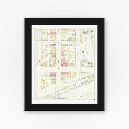Old map wall art mockup — black gallery frame with white mat — Sanborn Fire Insurance Map from Evart, Osceola County, Michigan (1910), Sheet #0004