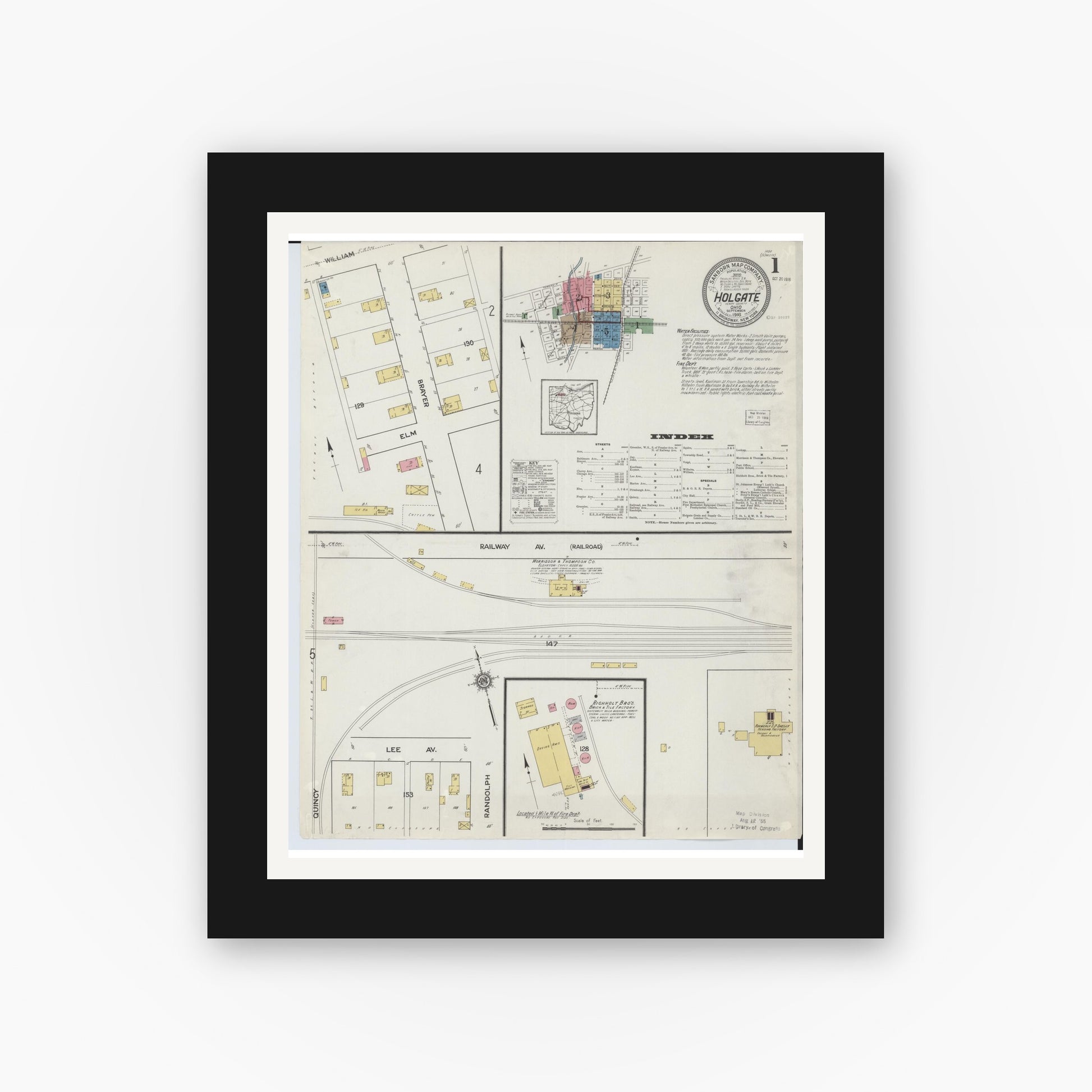 Old map wall art mockup — black gallery frame with white mat — Sanborn Fire Insurance Map from Holgate, Henry County, Ohio (1916), Sheet #0001