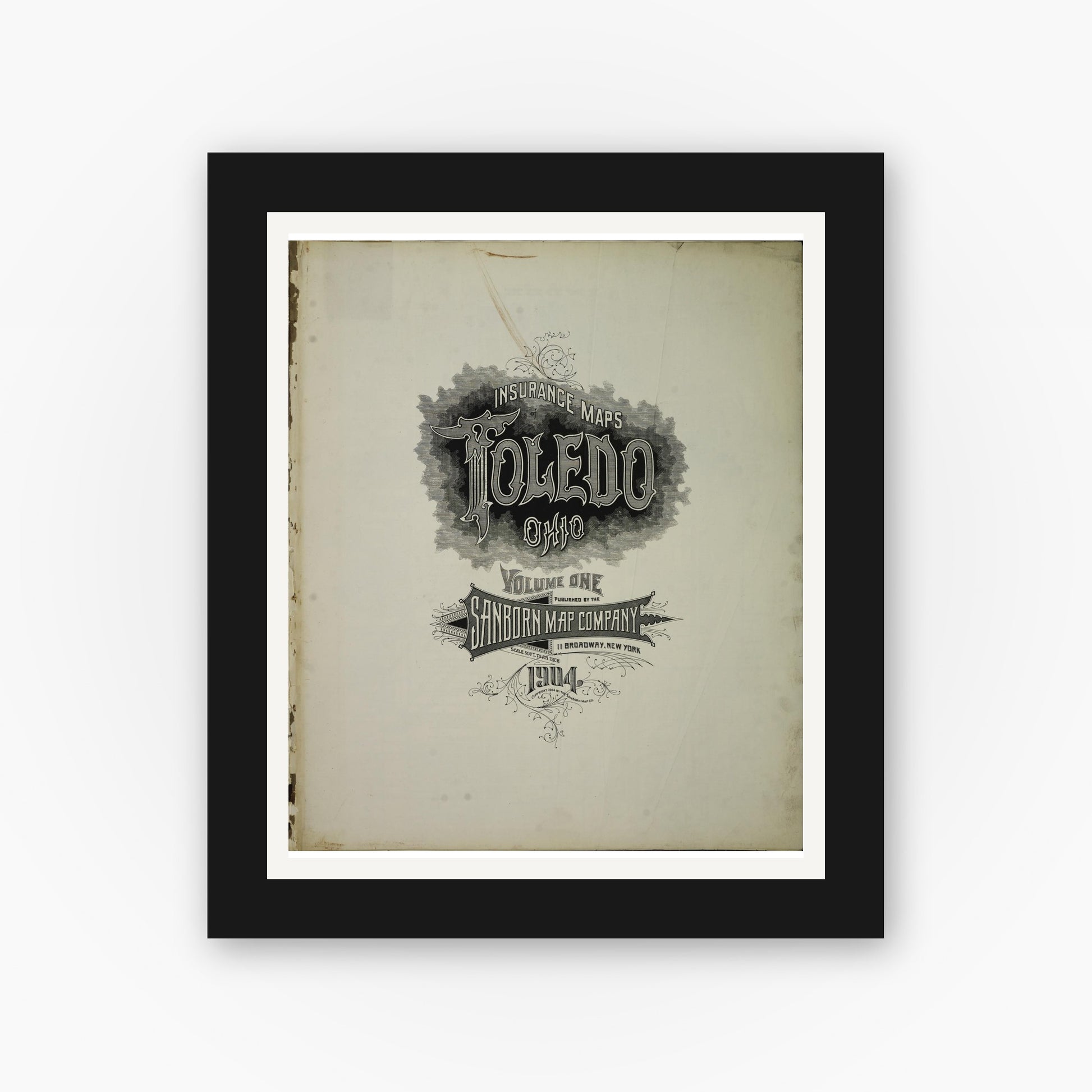 Old map wall art mockup — black gallery frame with white mat — Sanborn Fire Insurance Map from Toledo, Lucas County, Ohio (1904), Sheet #0001