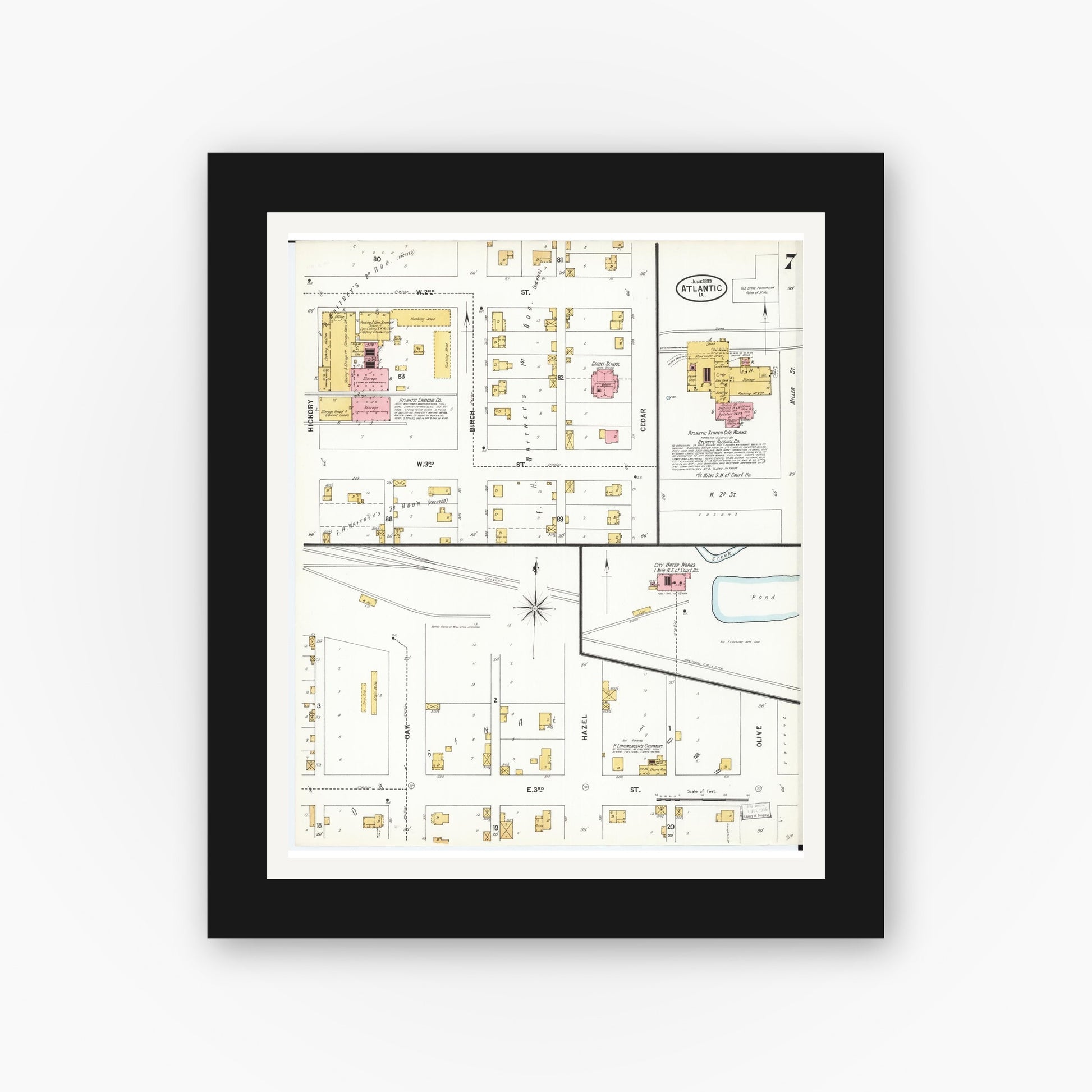 Old map wall art mockup — black gallery frame with white mat — Sanborn Fire Insurance Map from Atlantic, Cass County, Iowa (1899), Sheet #0007