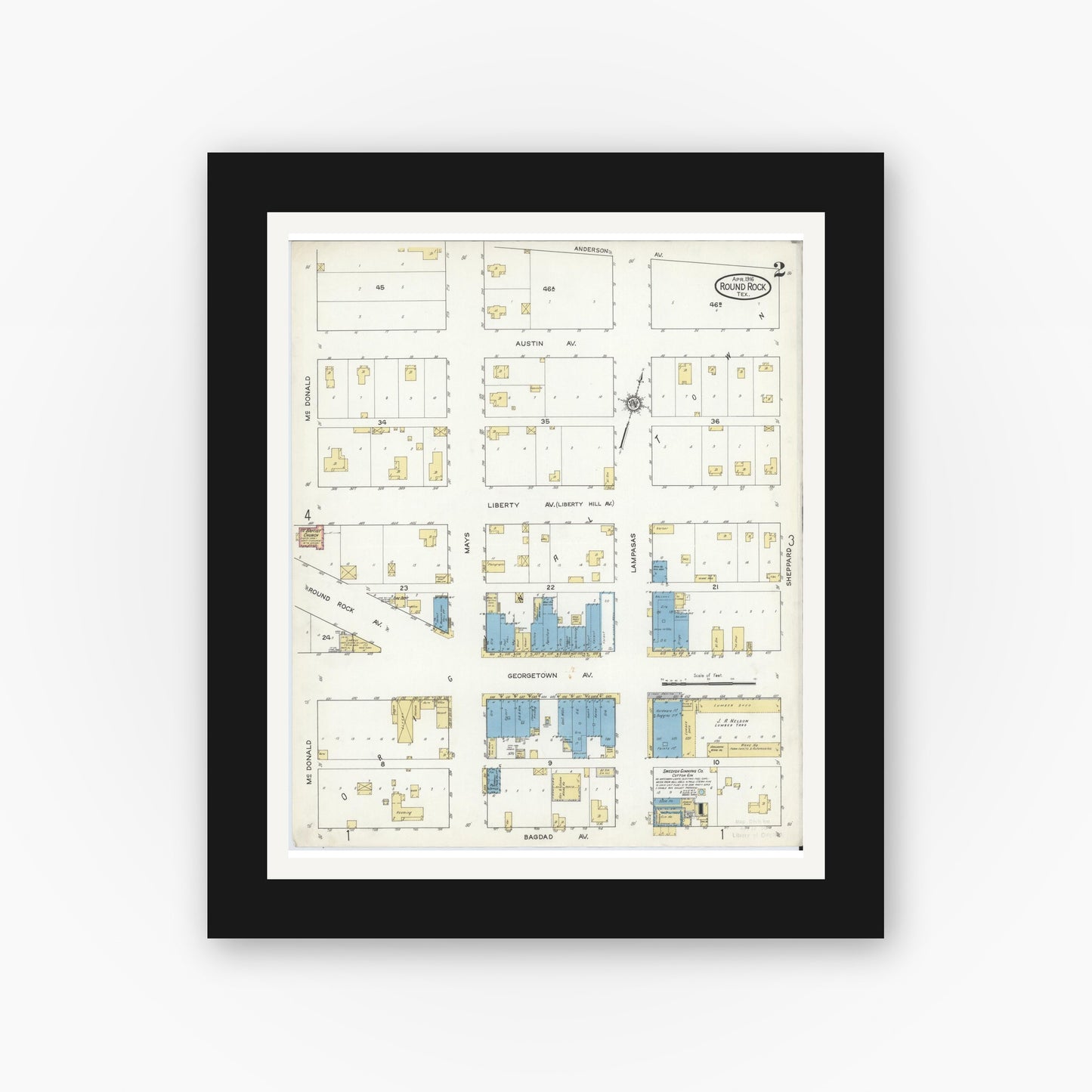 Old map wall art mockup — black gallery frame with white mat — Sanborn Fire Insurance Map from Round Rock, Williamson County, Texas (1916), Sheet #0002