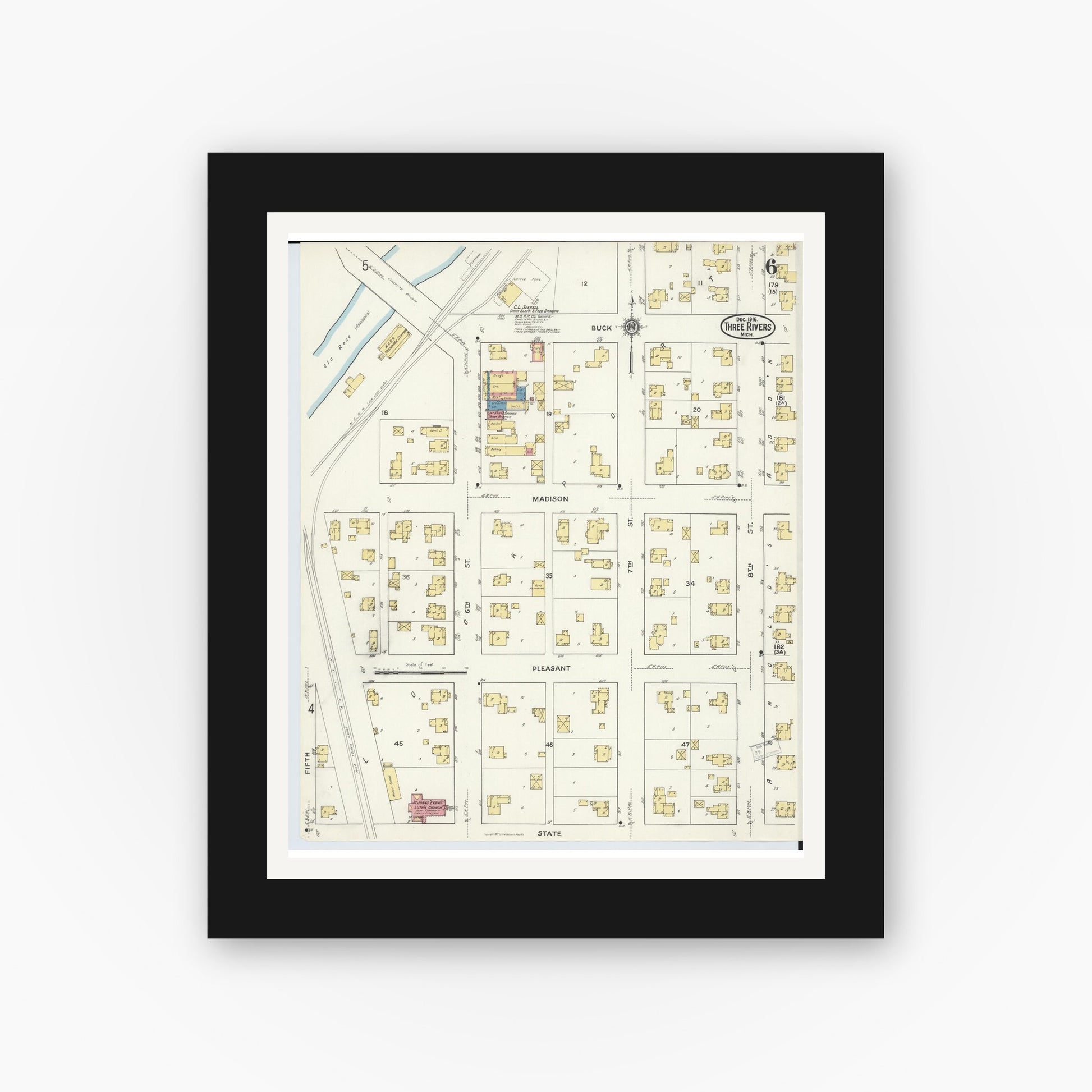 Old map wall art mockup — black gallery frame with white mat — Sanborn Fire Insurance Map from Three Rivers, Saint Joseph County, Michigan (1916), Sheet #0006