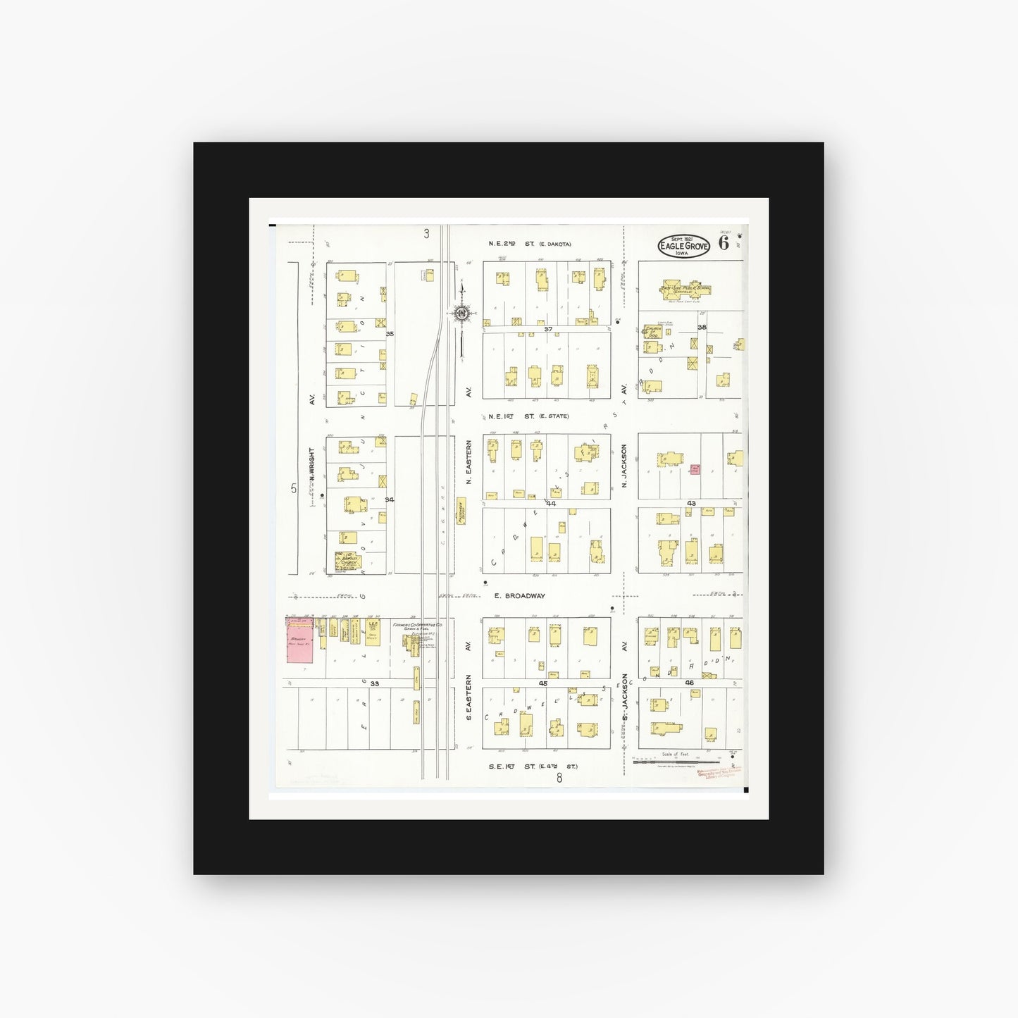 Old map wall art mockup — black gallery frame with white mat — Sanborn Fire Insurance Map from Eagle Grove, Wright County, Iowa (1921), Sheet #0006