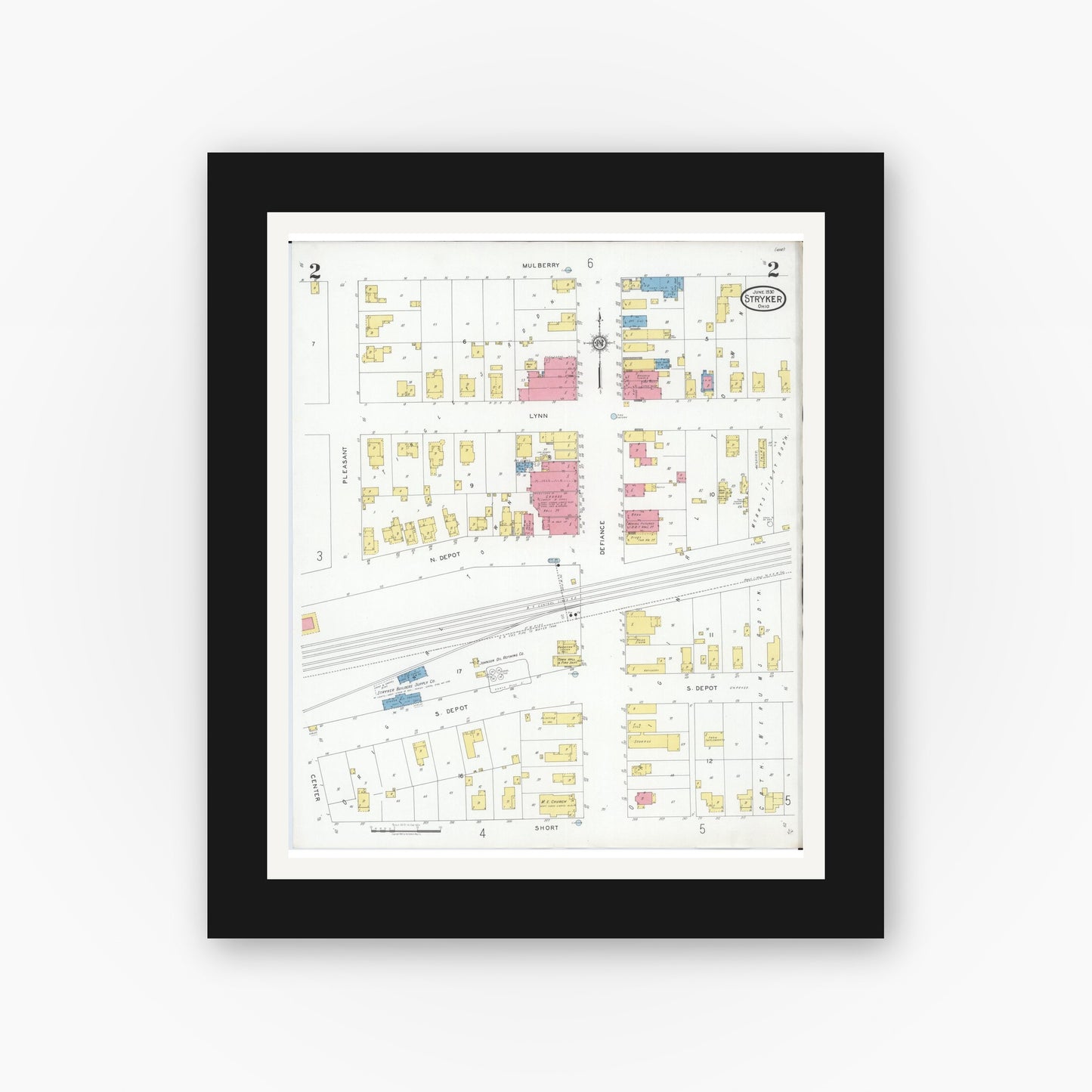 Old map wall art mockup — black gallery frame with white mat — Sanborn Fire Insurance Map from Stryker, Williams County, Ohio (1930), Sheet #0002