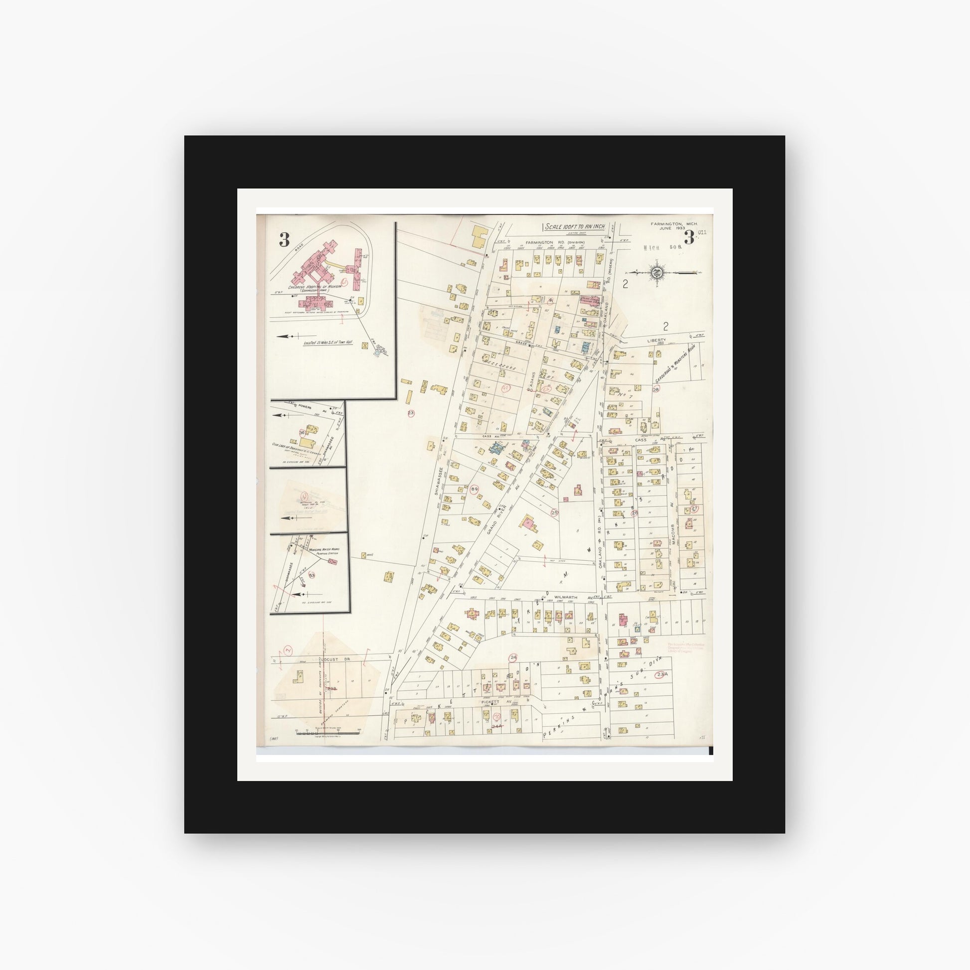 Old map wall art mockup — black gallery frame with white mat — Sanborn Fire Insurance Map from Farmington, Oakland County, Michigan (1943), Sheet #0003