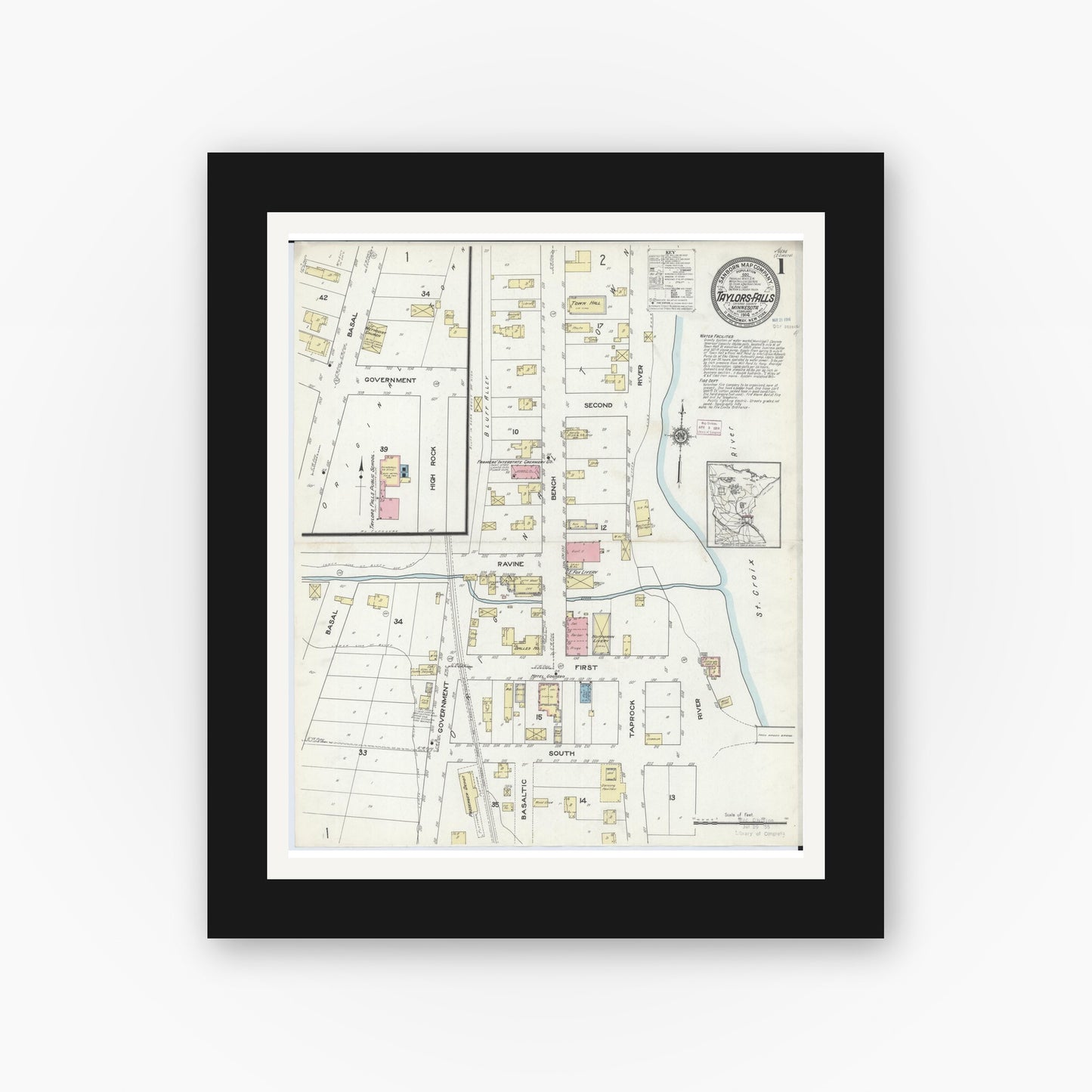 Old map wall art mockup — black gallery frame with white mat — Sanborn Fire Insurance Map from Taylors Falls, Chisago County, Minnesota (1914) - Complete Map Set