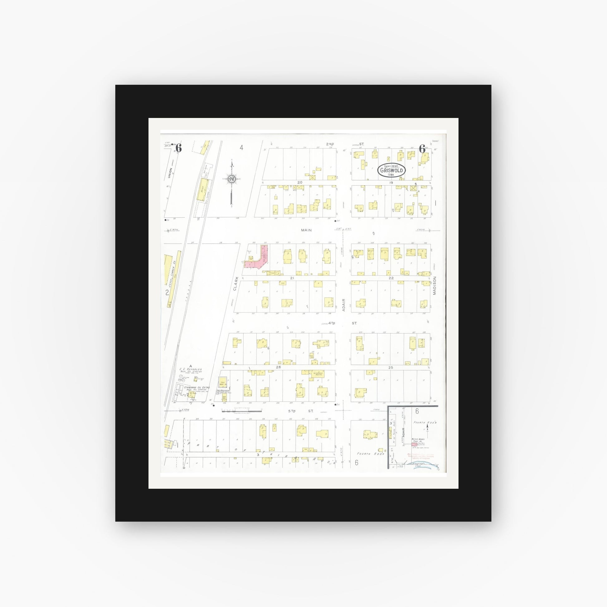 Old map wall art mockup — black gallery frame with white mat — Sanborn Fire Insurance Map from Griswold, Cass County, Iowa (1930), Sheet #0006