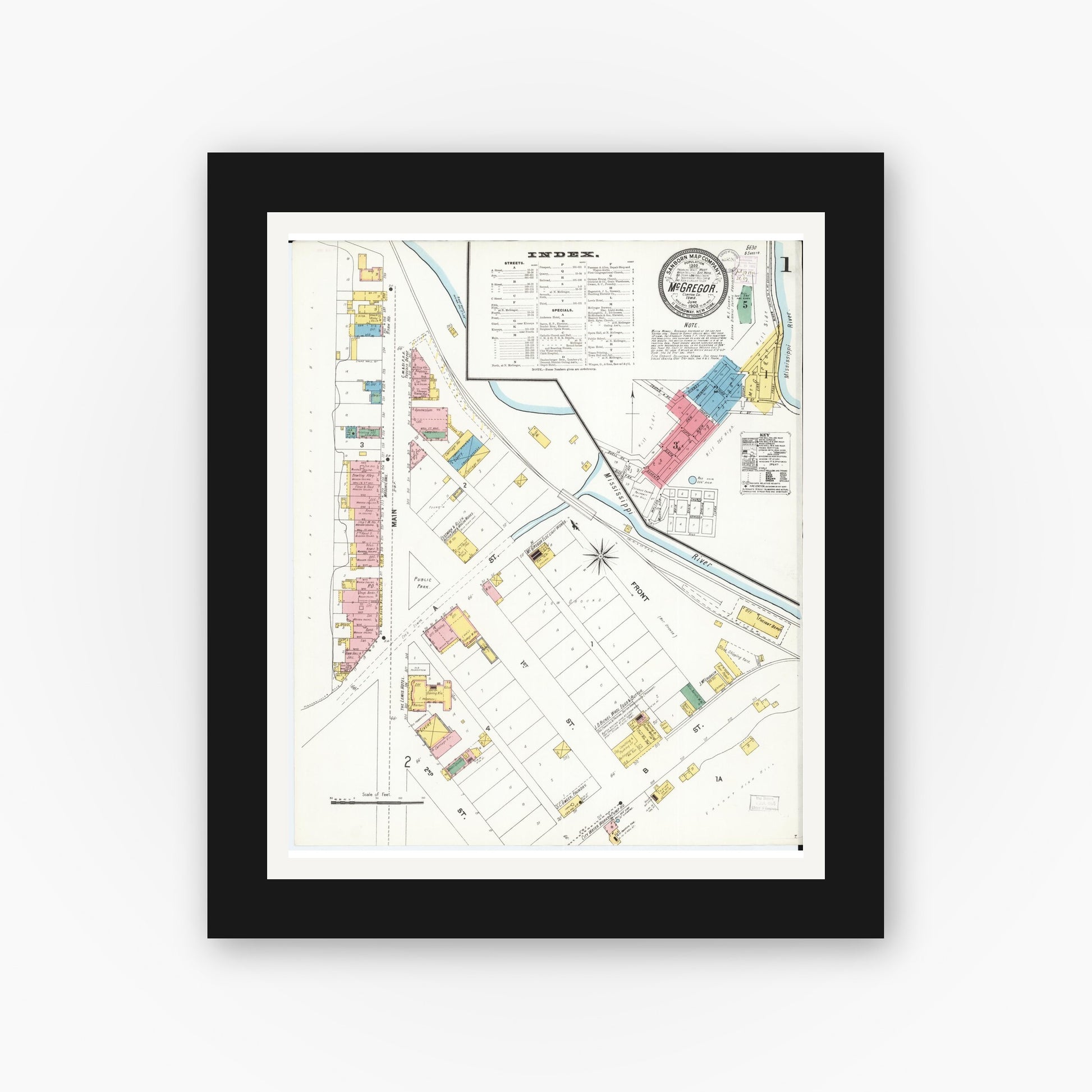 Old map wall art mockup — black gallery frame with white mat — Sanborn Fire Insurance Map from McGregor, Clayton County, Iowa (1902) â€” Complete Set
