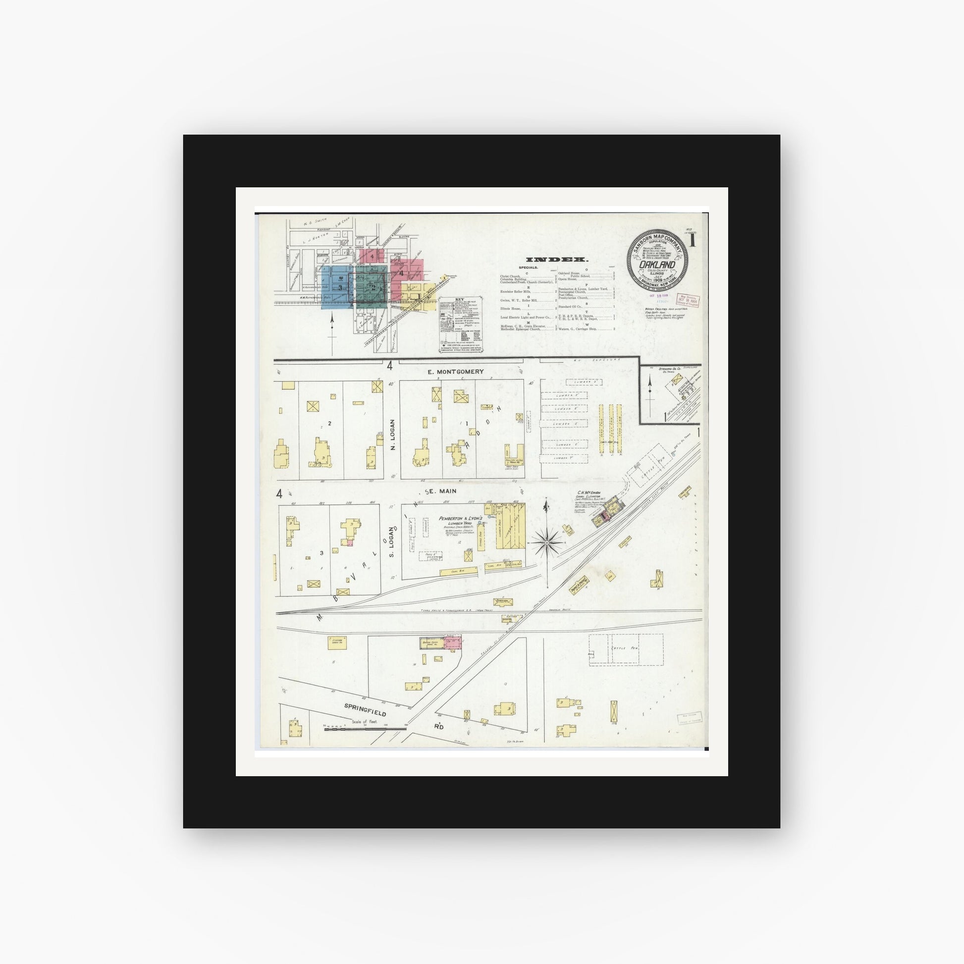 Old map wall art mockup — black gallery frame with white mat — Sanborn Fire Insurance Map from Oakland, Coles County, Illinois (1909), Sheet #0001