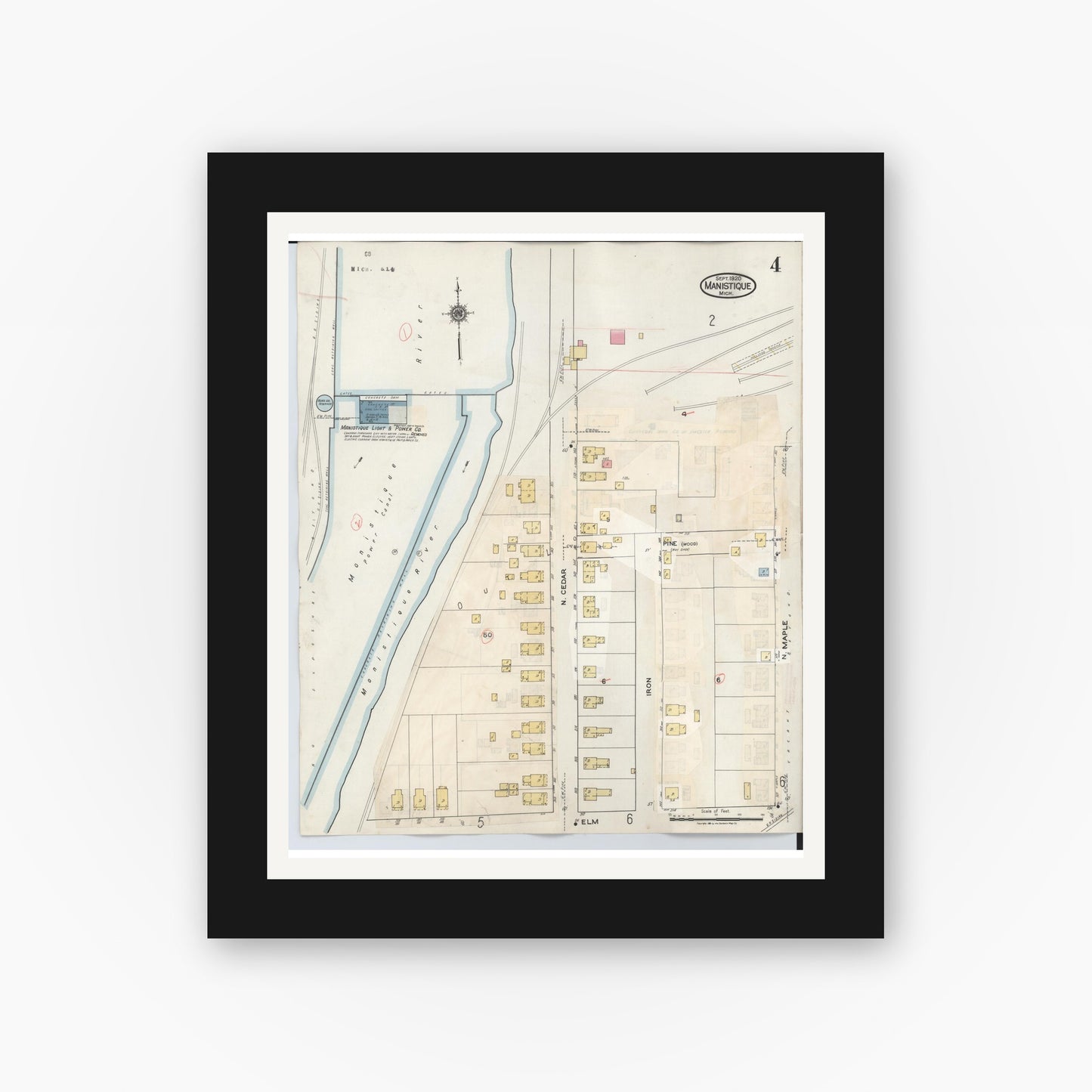 Old map wall art mockup — black gallery frame with white mat — Sanborn Fire Insurance Map from Manistique, Schoolcraft County, Michigan (1950), Sheet #0004