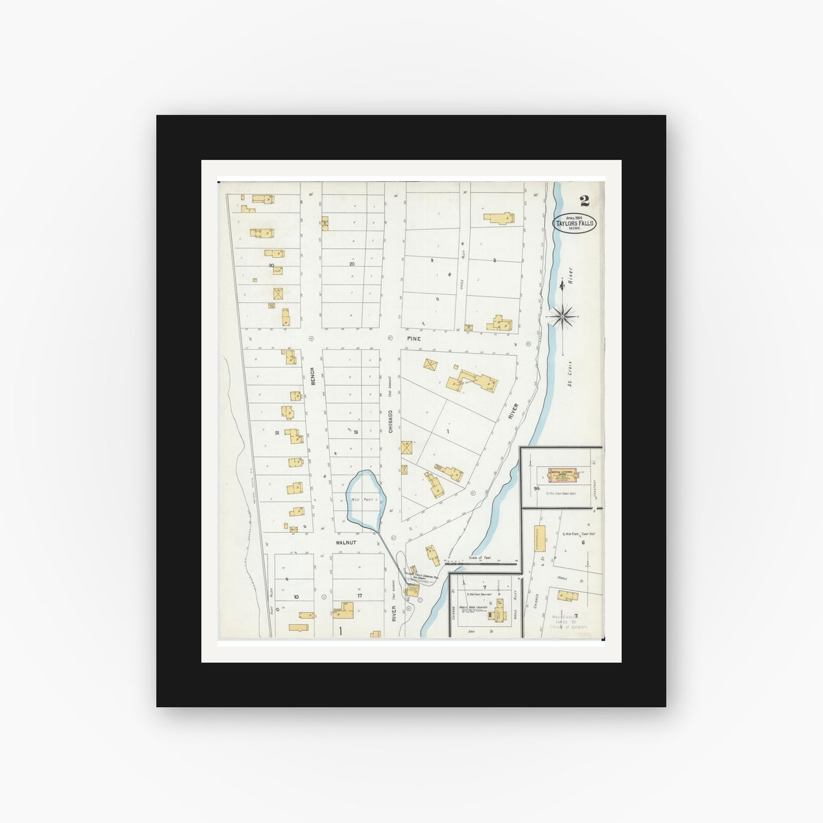 Old map wall art mockup — black gallery frame with white mat — Sanborn Fire Insurance Map from Taylors Falls, Chisago County, Minnesota (1904), Sheet #0002