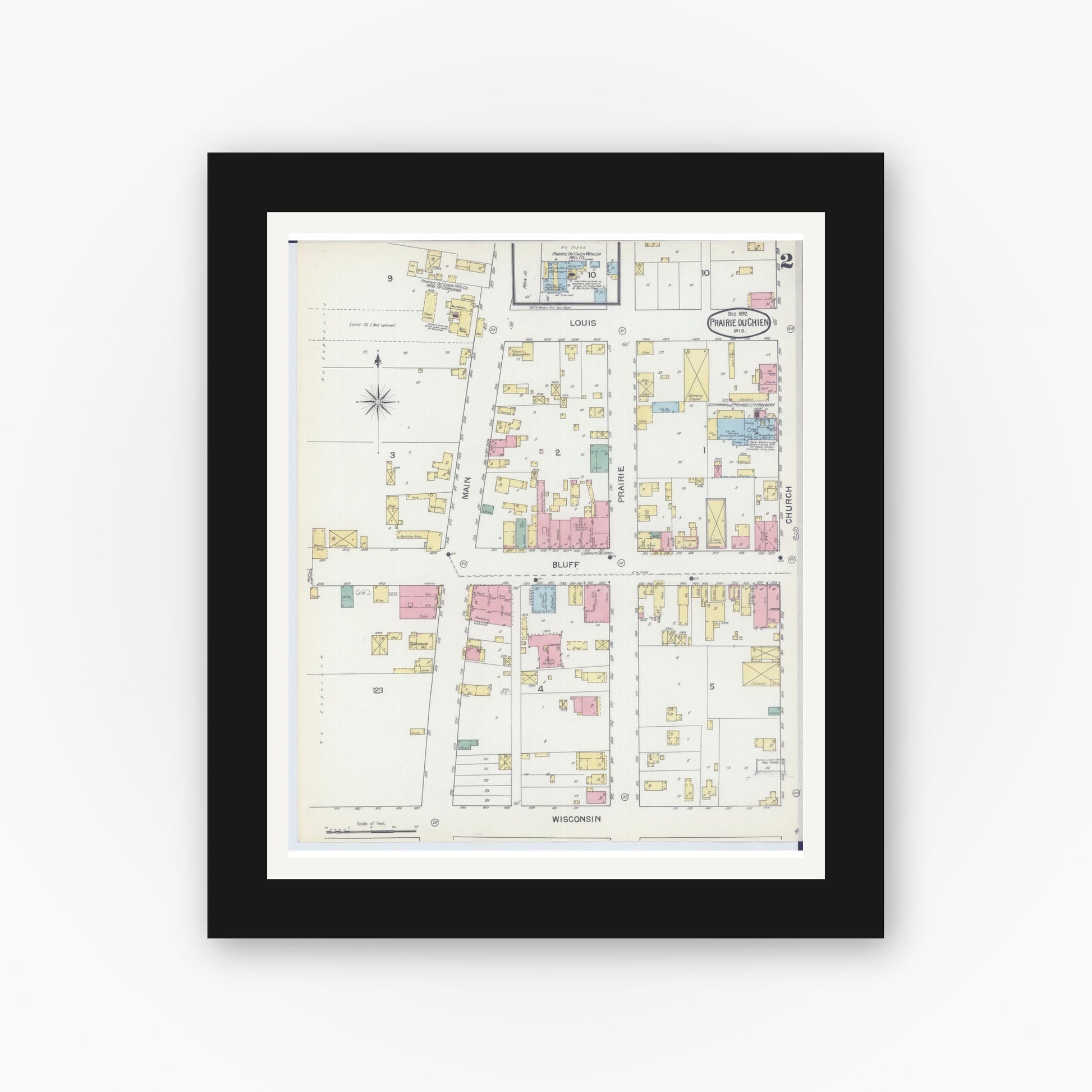 Old map wall art mockup — black gallery frame with white mat — Sanborn Fire Insurance Map from Prairie du Chien, Crawford County, Wisconsin (1892), Sheet #0002