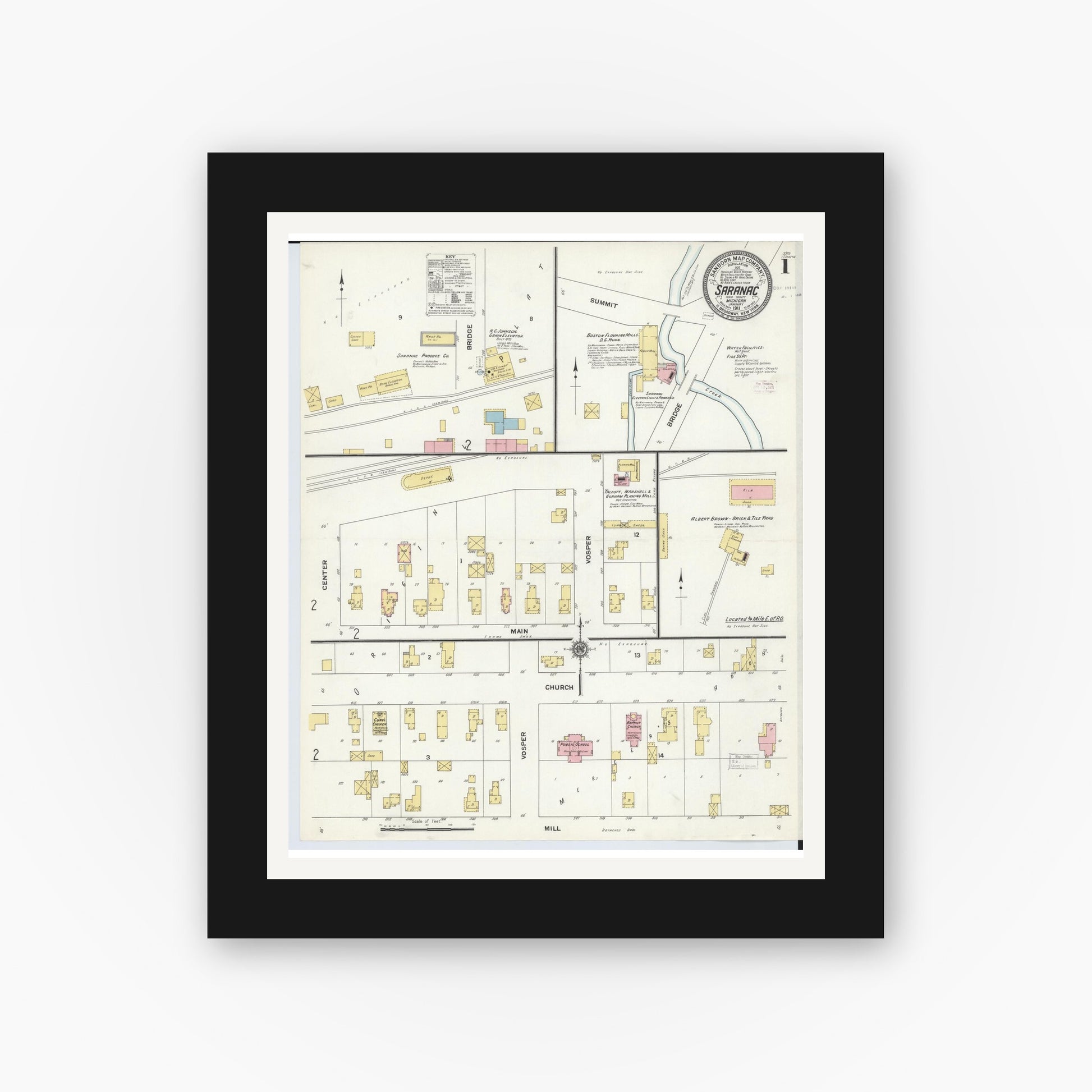 Old map wall art mockup — black gallery frame with white mat — Sanborn Fire Insurance Map from Saranac, Ionia County, Michigan (1911) - Complete Map Set