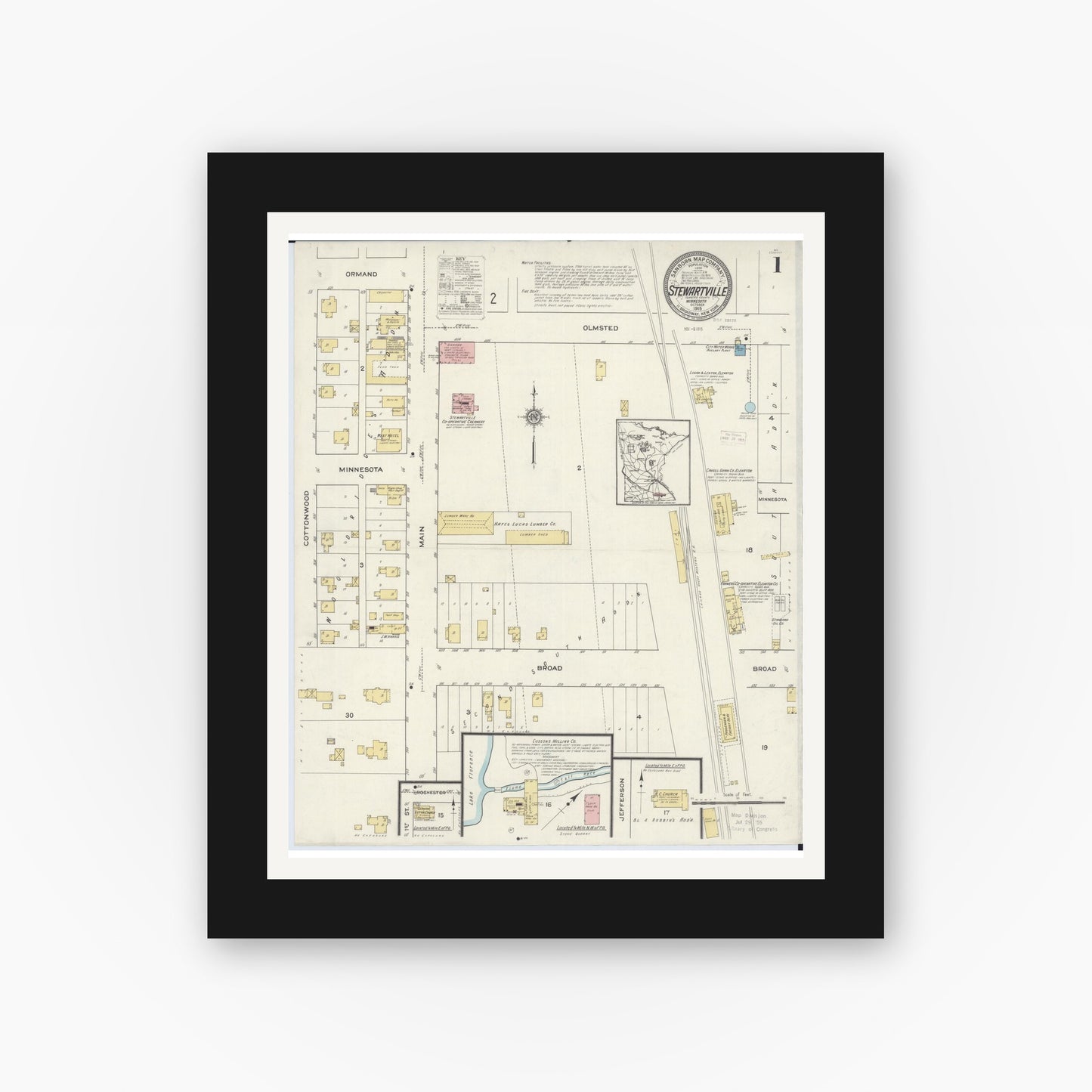 Old map wall art mockup — black gallery frame with white mat — Sanborn Fire Insurance Map from Stewartville, Olmsted County, Minnesota (1915) - Complete Map Set