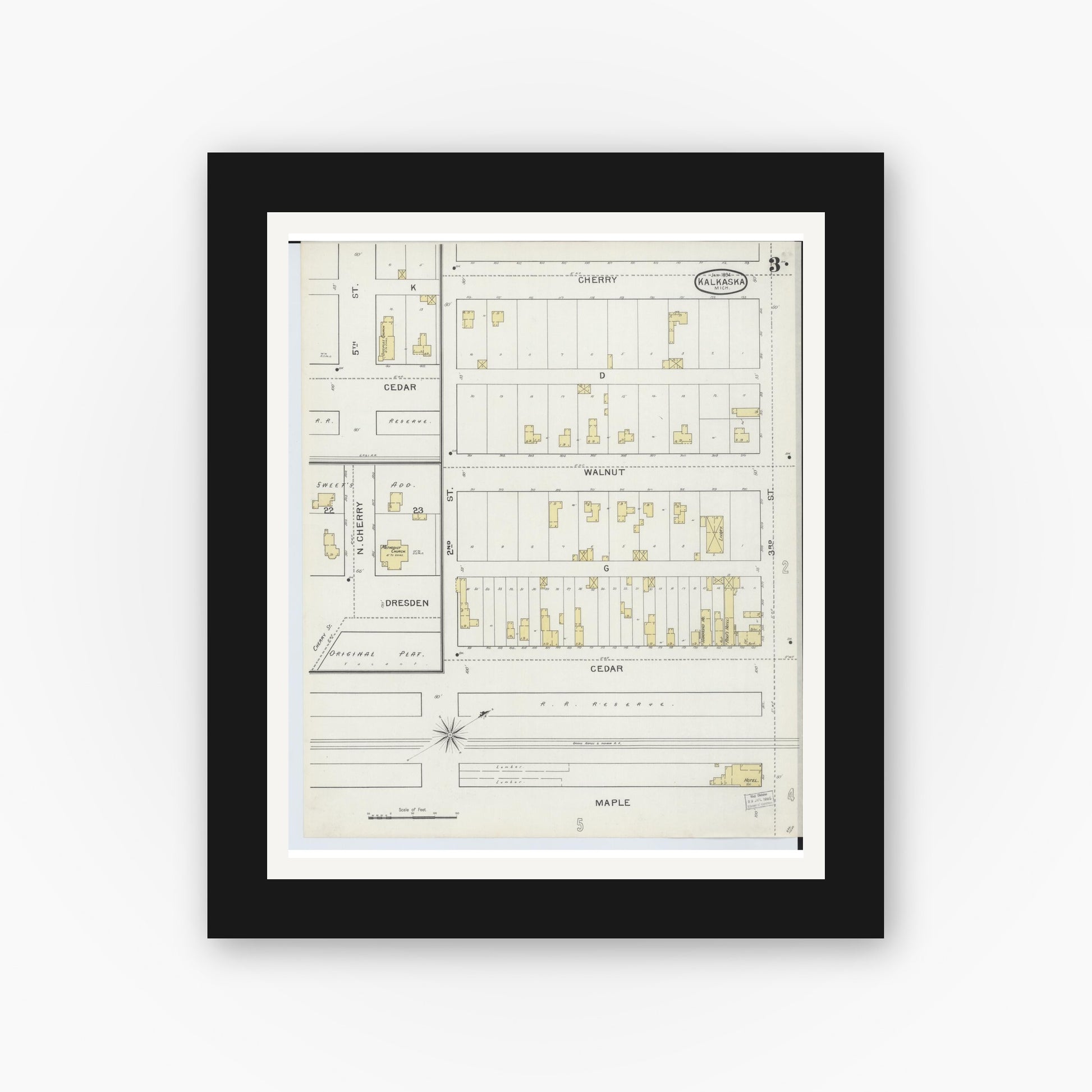 Old map wall art mockup — black gallery frame with white mat — Sanborn Fire Insurance Map from Kalkaska, Kalkaska County, Michigan (1894), Sheet #0003