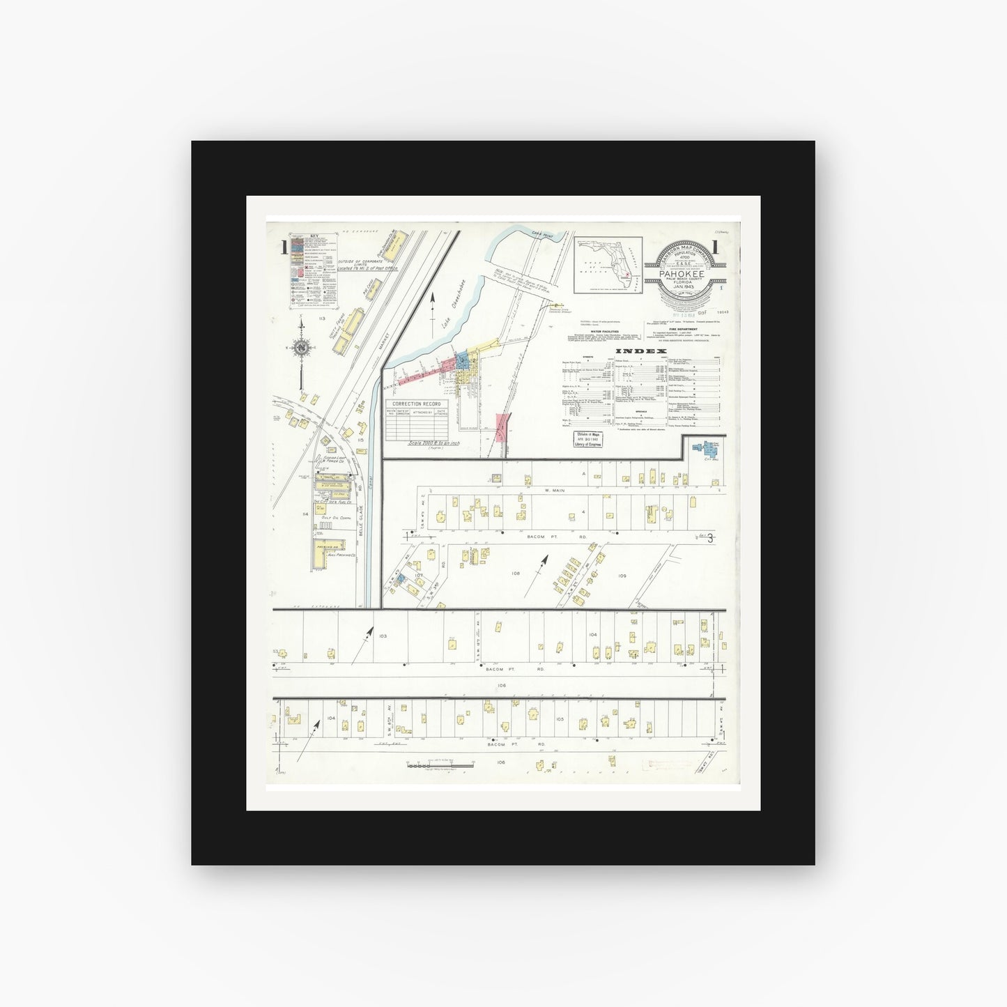 Old map wall art mockup — black gallery frame with white mat — Sanborn Fire Insurance Map from Pahokee, Palm Beach County, Florida (1943), Sheet #0001