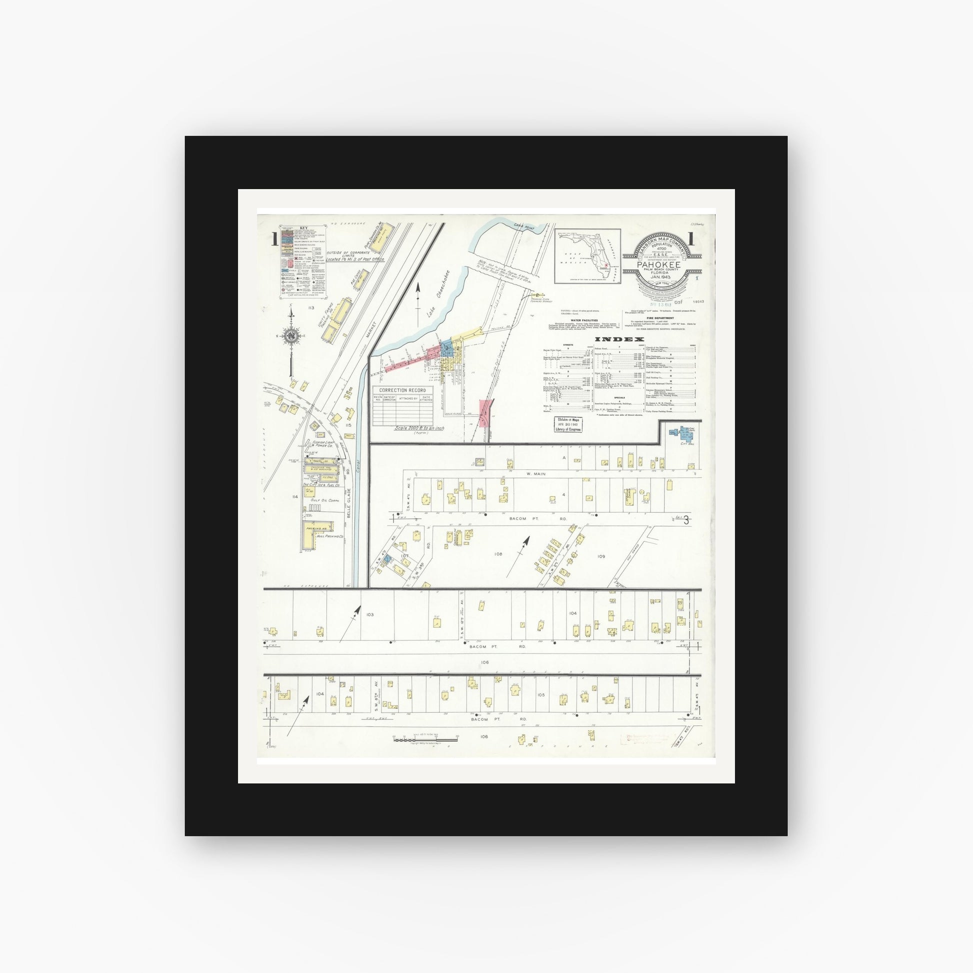 Old map wall art mockup — black gallery frame with white mat — Sanborn Fire Insurance Map from Pahokee, Palm Beach County, Florida (1943), Sheet #0001