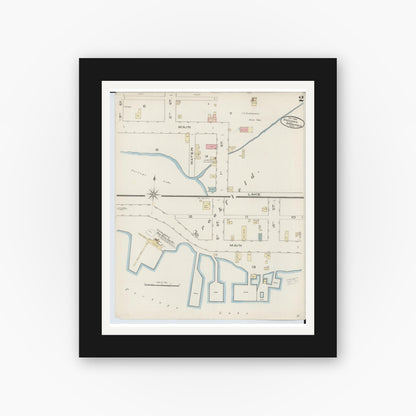 Old map wall art mockup — black gallery frame with white mat — Sanborn Fire Insurance Map from Onekama, Manistee County, Michigan (1885), Sheet #0002