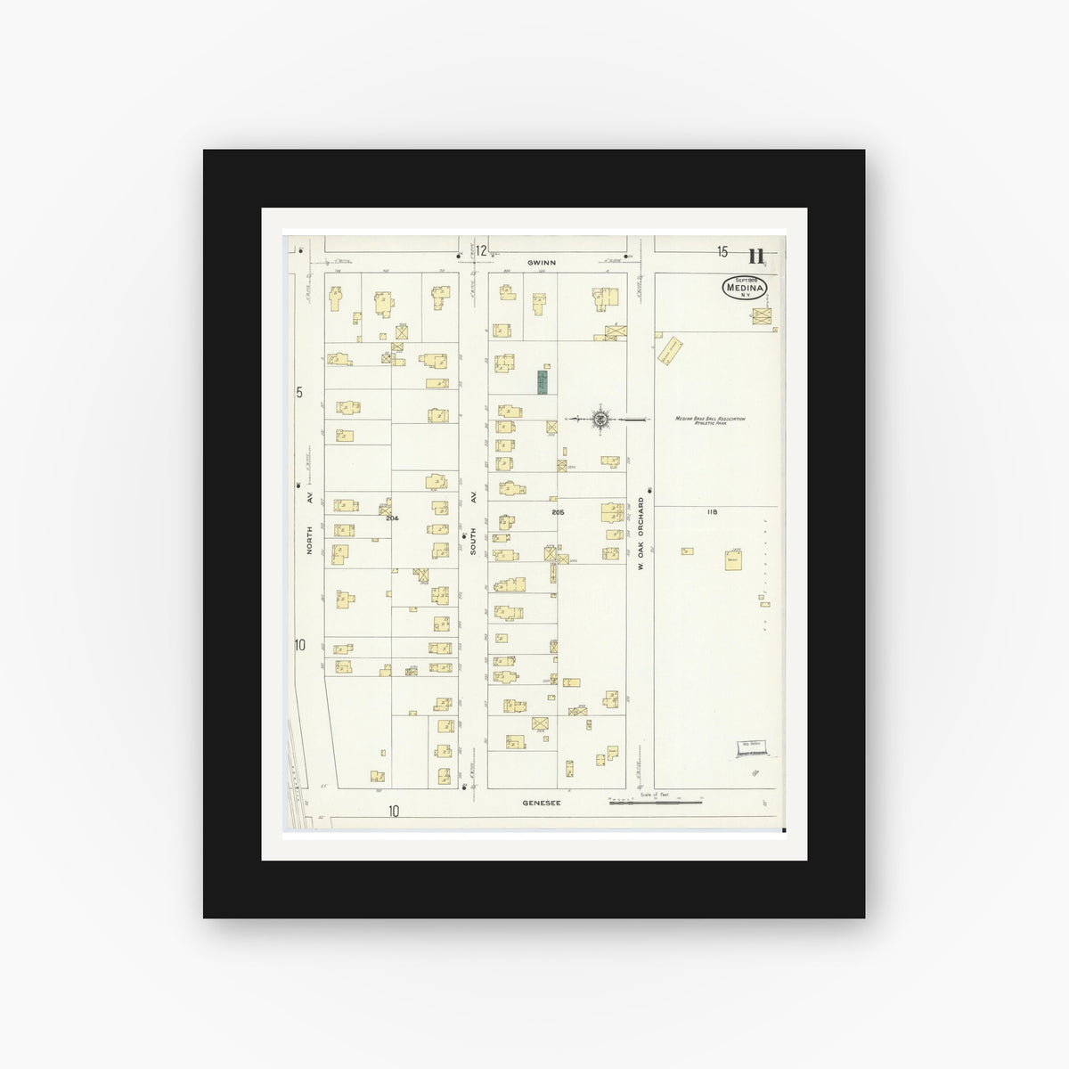 Old map wall art mockup — black gallery frame with white mat — Sanborn Fire Insurance Map from Medina, Orleans County, New York (1909), Sheet #0011