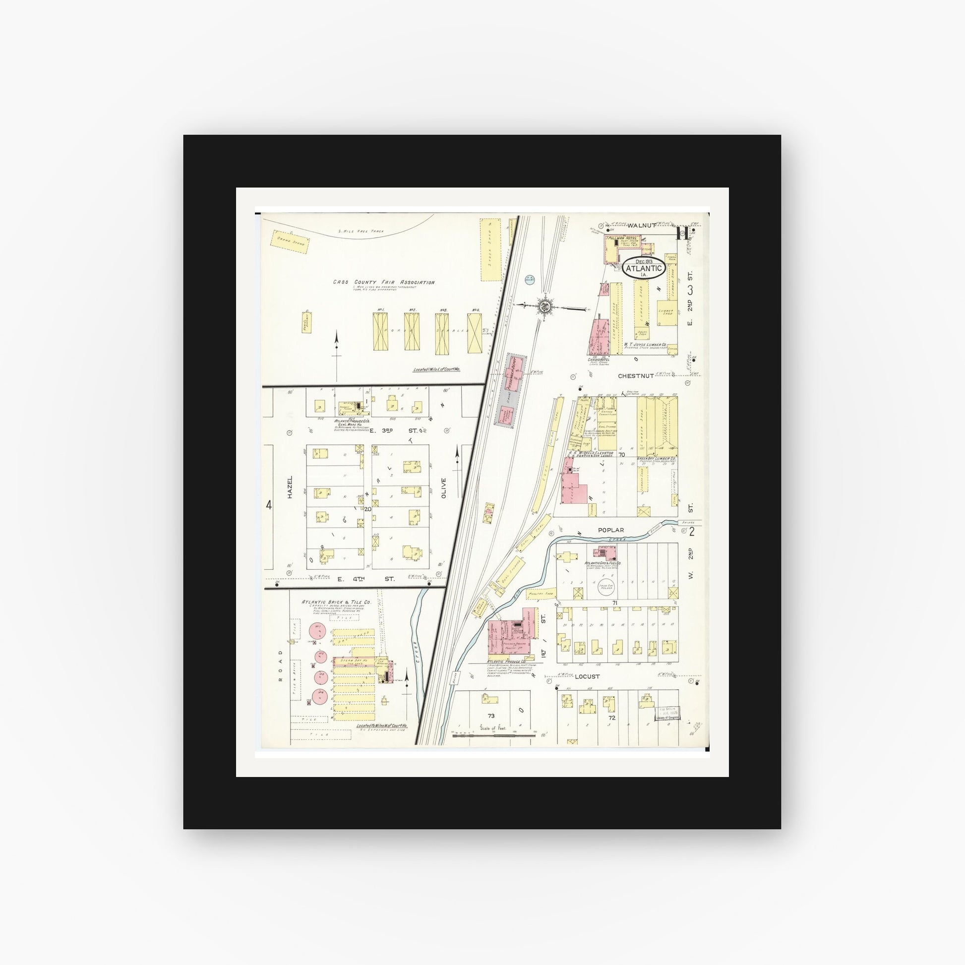 Old map wall art mockup — black gallery frame with white mat — Sanborn Fire Insurance Map from Atlantic, Cass County, Iowa (1913), Sheet #0011