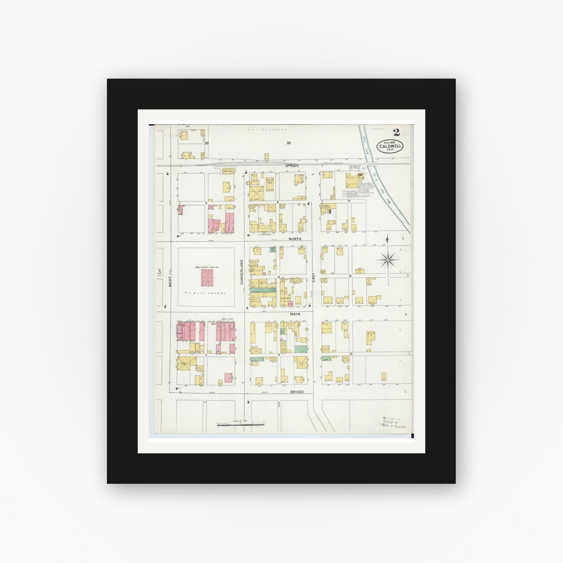 Old map wall art mockup — black gallery frame with white mat — Sanborn Fire Insurance Map from Caldwell, Noble County, Ohio (1899), Sheet #0002