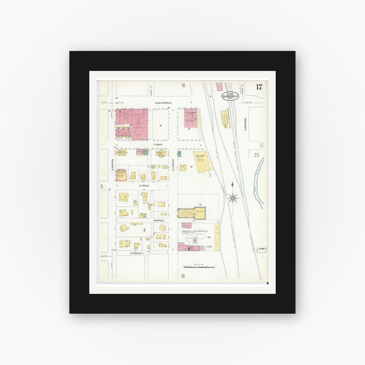 Old map wall art mockup — black gallery frame with white mat — Sanborn Fire Insurance Map from Gainesville, Cooke County, Texas (1908), Sheet #0017
