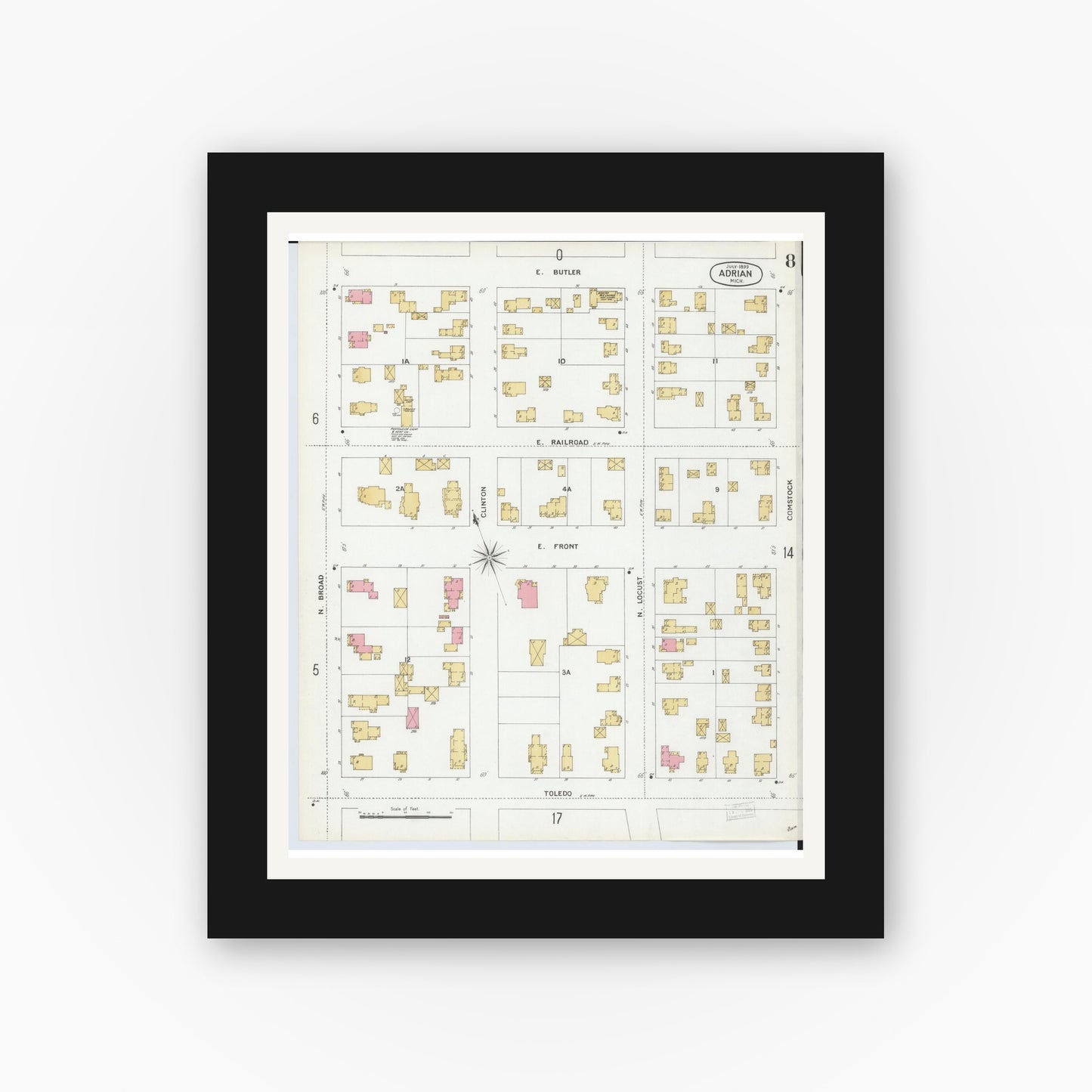 Old map wall art mockup — black gallery frame with white mat — Sanborn Fire Insurance Map from Adrian, Lenawee County, Michigan (1899), Sheet #0008