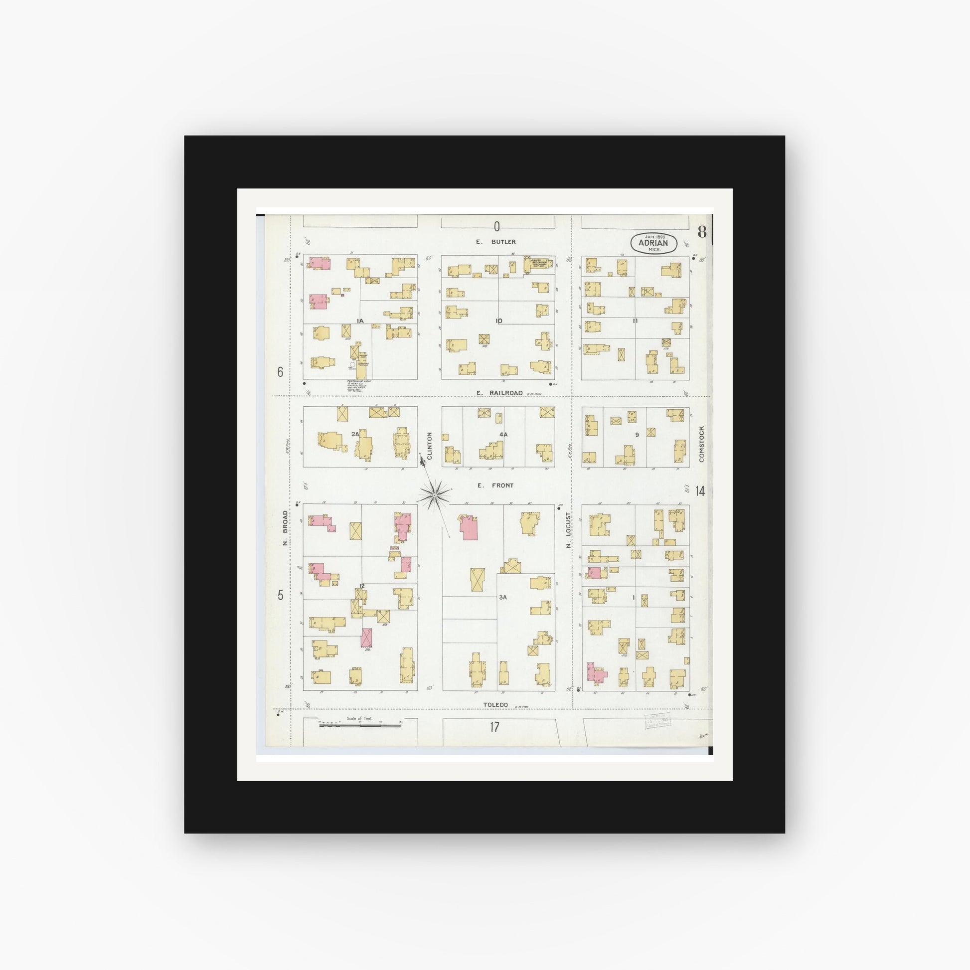 Old map wall art mockup — black gallery frame with white mat — Sanborn Fire Insurance Map from Adrian, Lenawee County, Michigan (1899), Sheet #0008