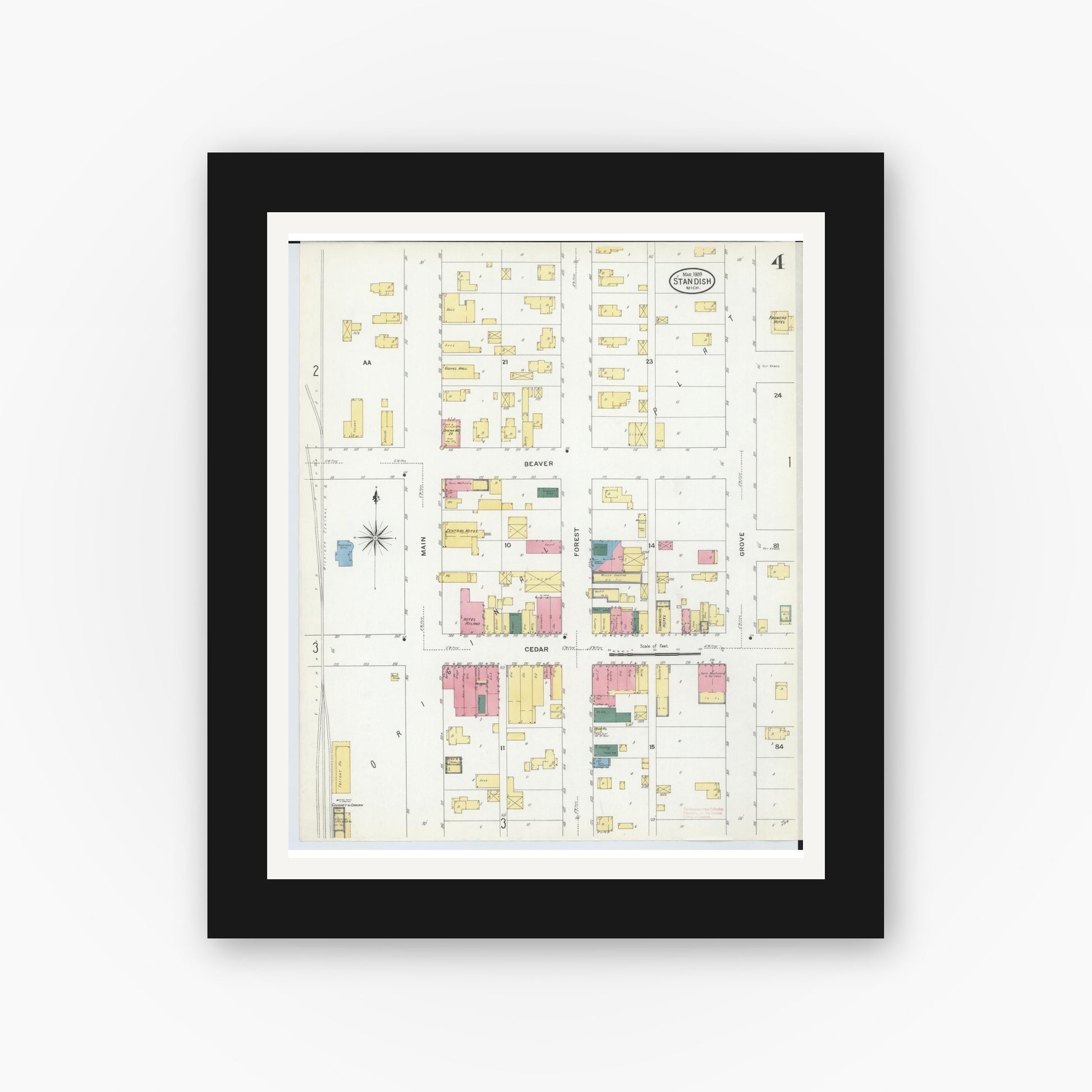 Old map wall art mockup — black gallery frame with white mat — Sanborn Fire Insurance Map from Standish, Arenac County, Michigan (1909), Sheet #0004