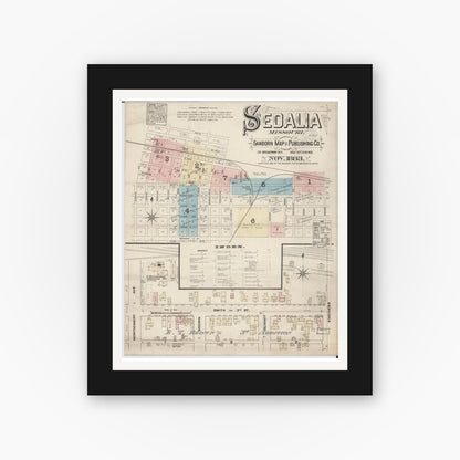 Old map wall art mockup — black gallery frame with white mat — Sanborn Fire Insurance Map from Sedalia, Pettis County, Missouri (1883), Sheet #0001