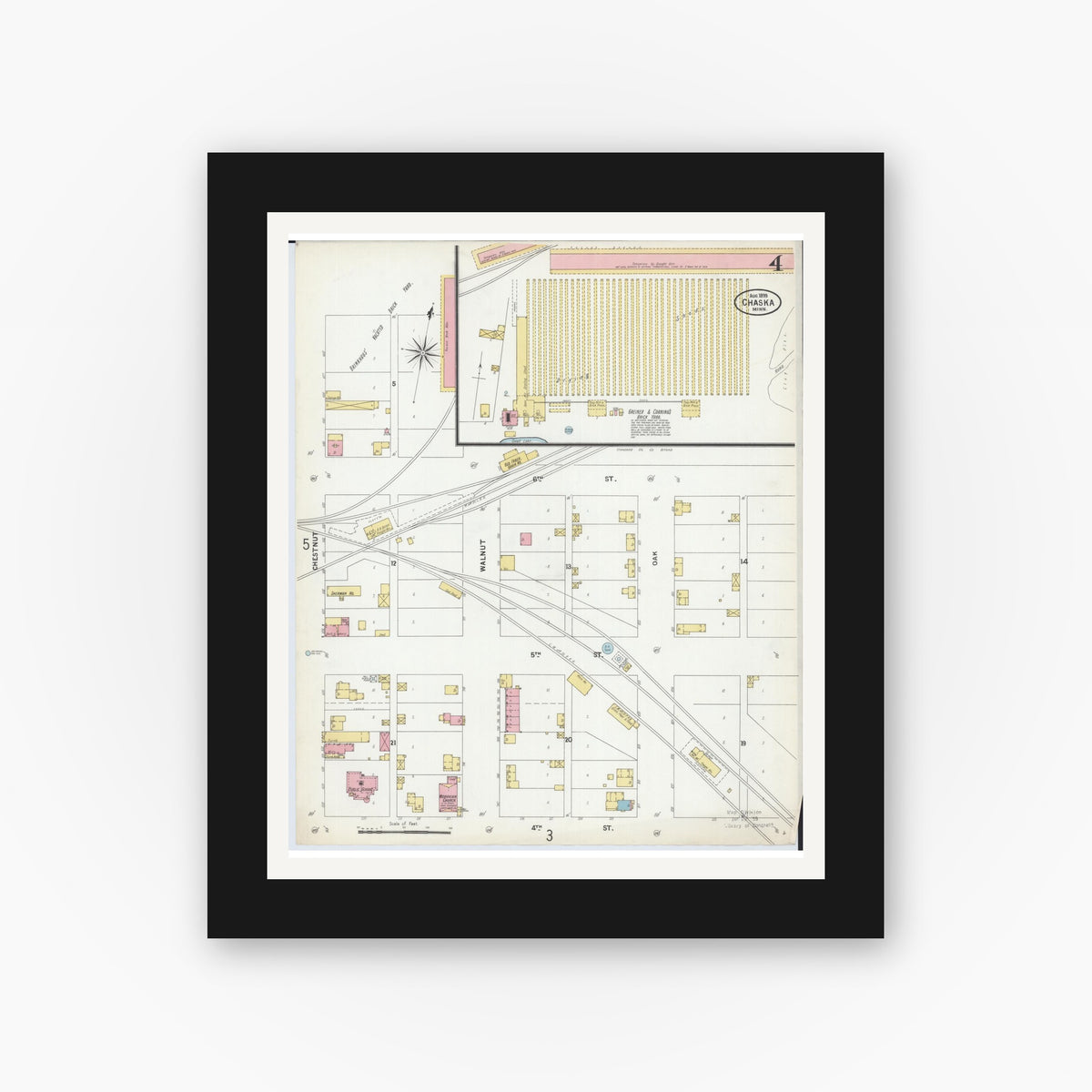 Old map wall art mockup — black gallery frame with white mat — Sanborn Fire Insurance Map from Chaska, Carver County, Minnesota (1899), Sheet #0004