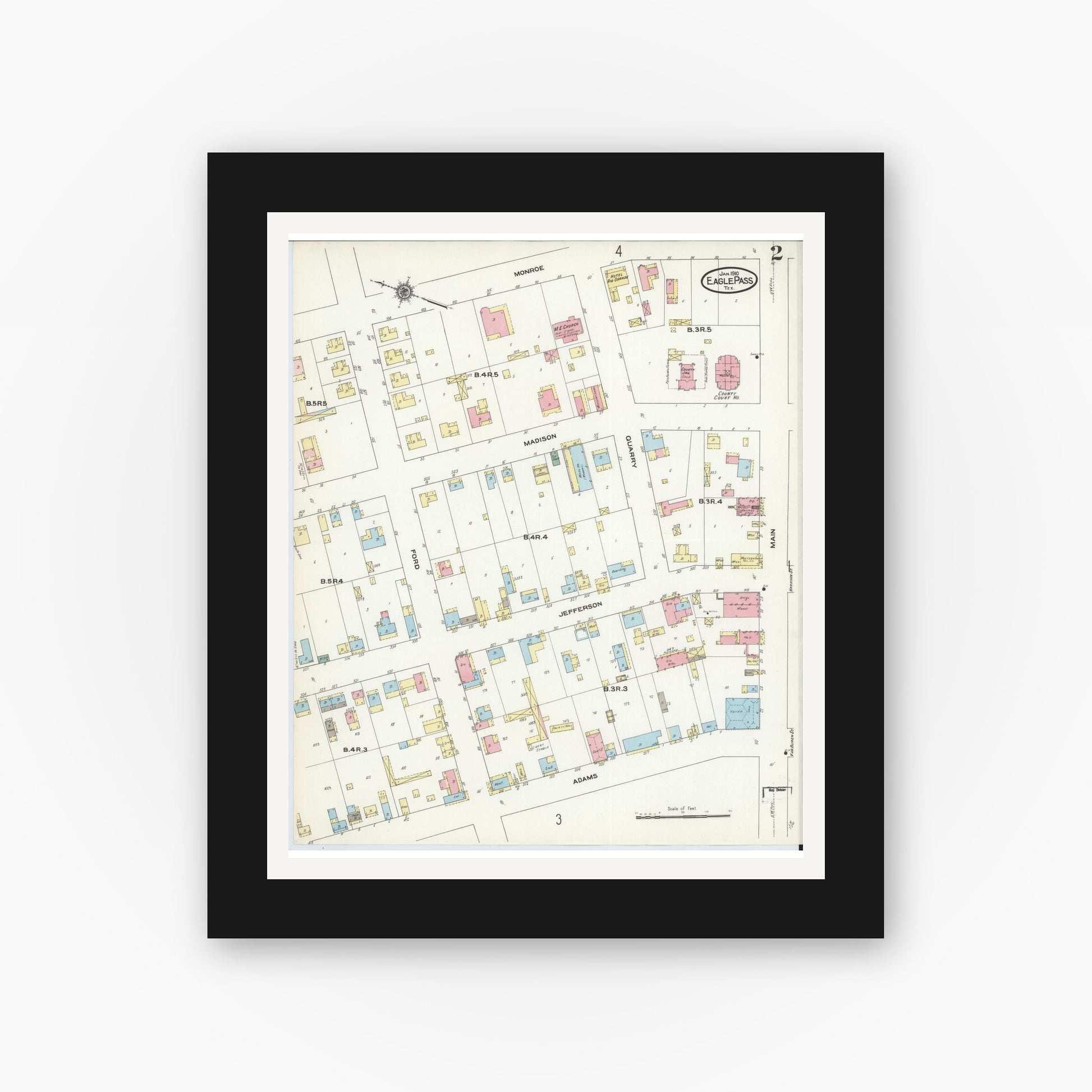 Old map wall art mockup — black gallery frame with white mat — Sanborn Fire Insurance Map from Eagle Pass, Maverick County, Texas (1910), Sheet #0002