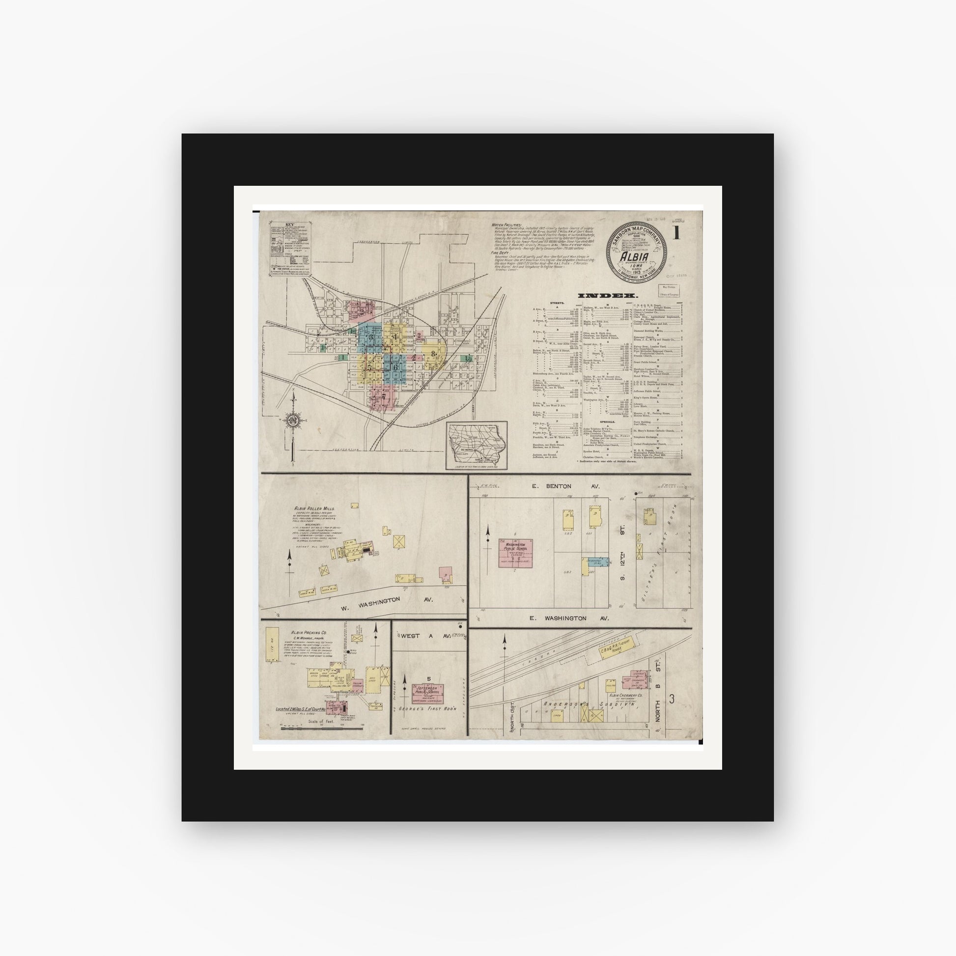 Old map wall art mockup — black gallery frame with white mat — Sanborn Fire Insurance Map from Albia, Monroe County, Iowa (1913) â€” Complete Set
