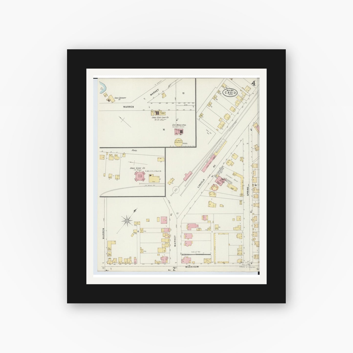 Old map wall art mockup — black gallery frame with white mat — Sanborn Fire Insurance Map from Cadiz, Harrison County, Ohio (1897), Sheet #0004