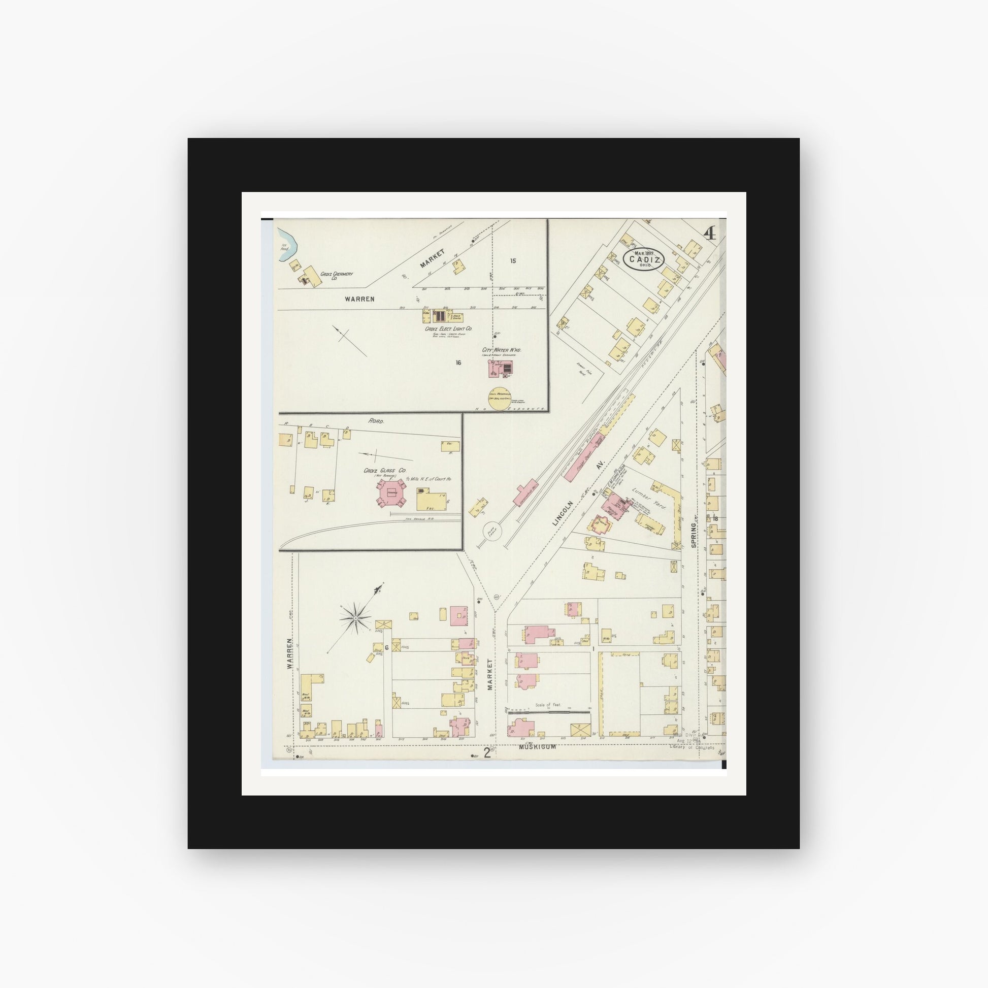 Old map wall art mockup — black gallery frame with white mat — Sanborn Fire Insurance Map from Cadiz, Harrison County, Ohio (1897), Sheet #0004