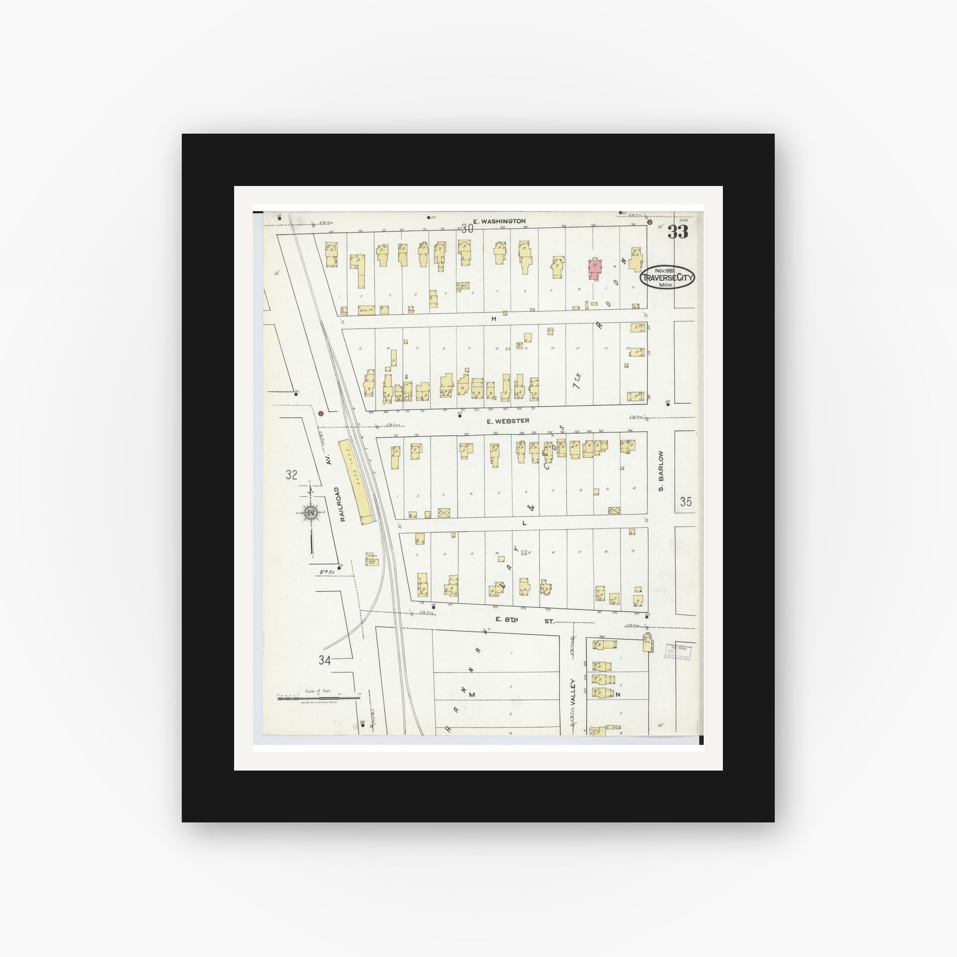 Old map wall art mockup — black gallery frame with white mat — Sanborn Fire Insurance Map from Traverse City, Grand Traverse County, Michigan (1920), Sheet #0033