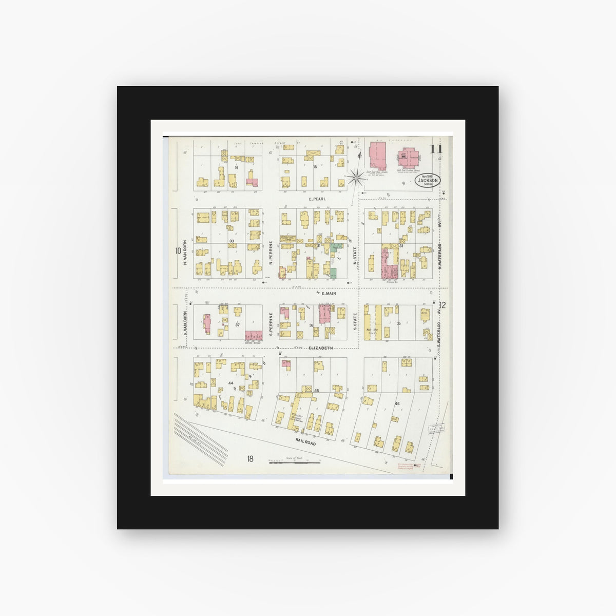 Old map wall art mockup — black gallery frame with white mat — Sanborn Fire Insurance Map from Jackson, Jackson County, Michigan (1899), Sheet #0011