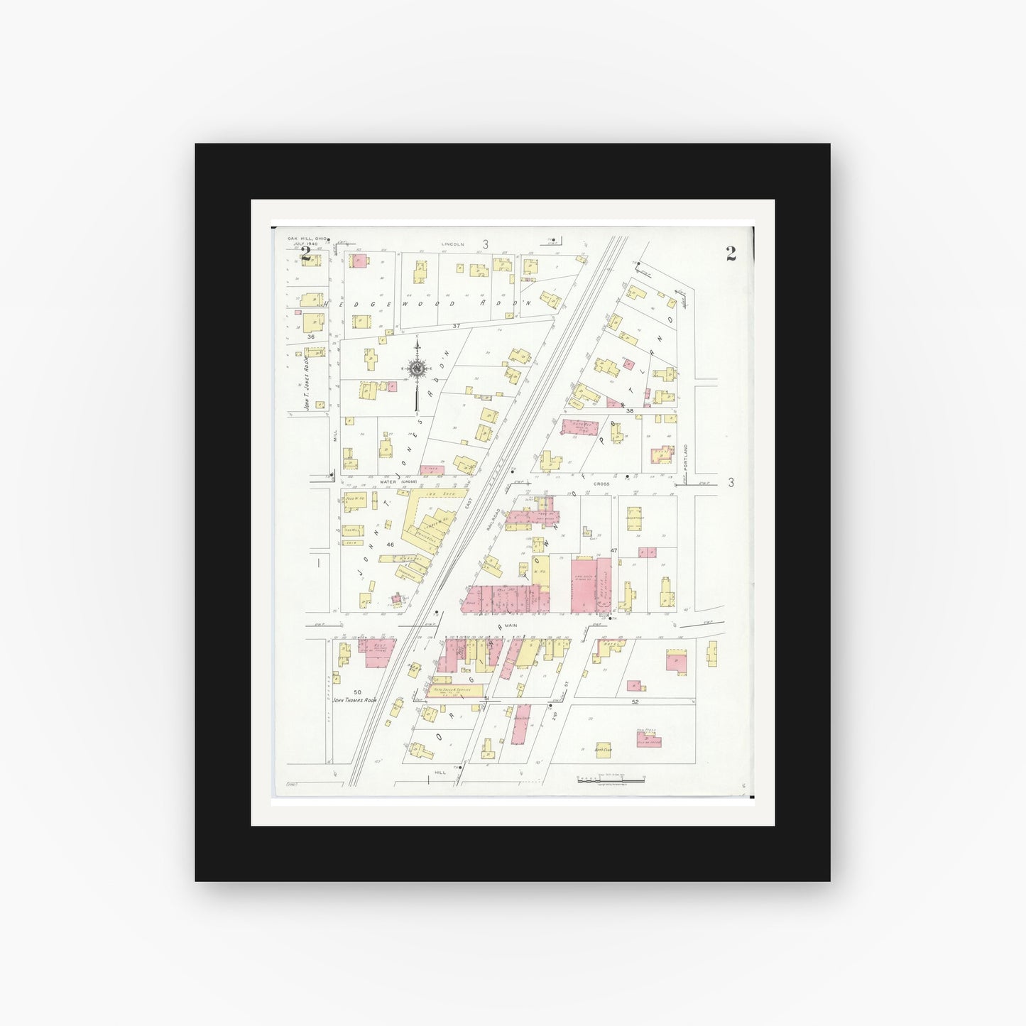 Old map wall art mockup — black gallery frame with white mat — Sanborn Fire Insurance Map from Oak Hill, Jackson County, Ohio (1940), Sheet #0002