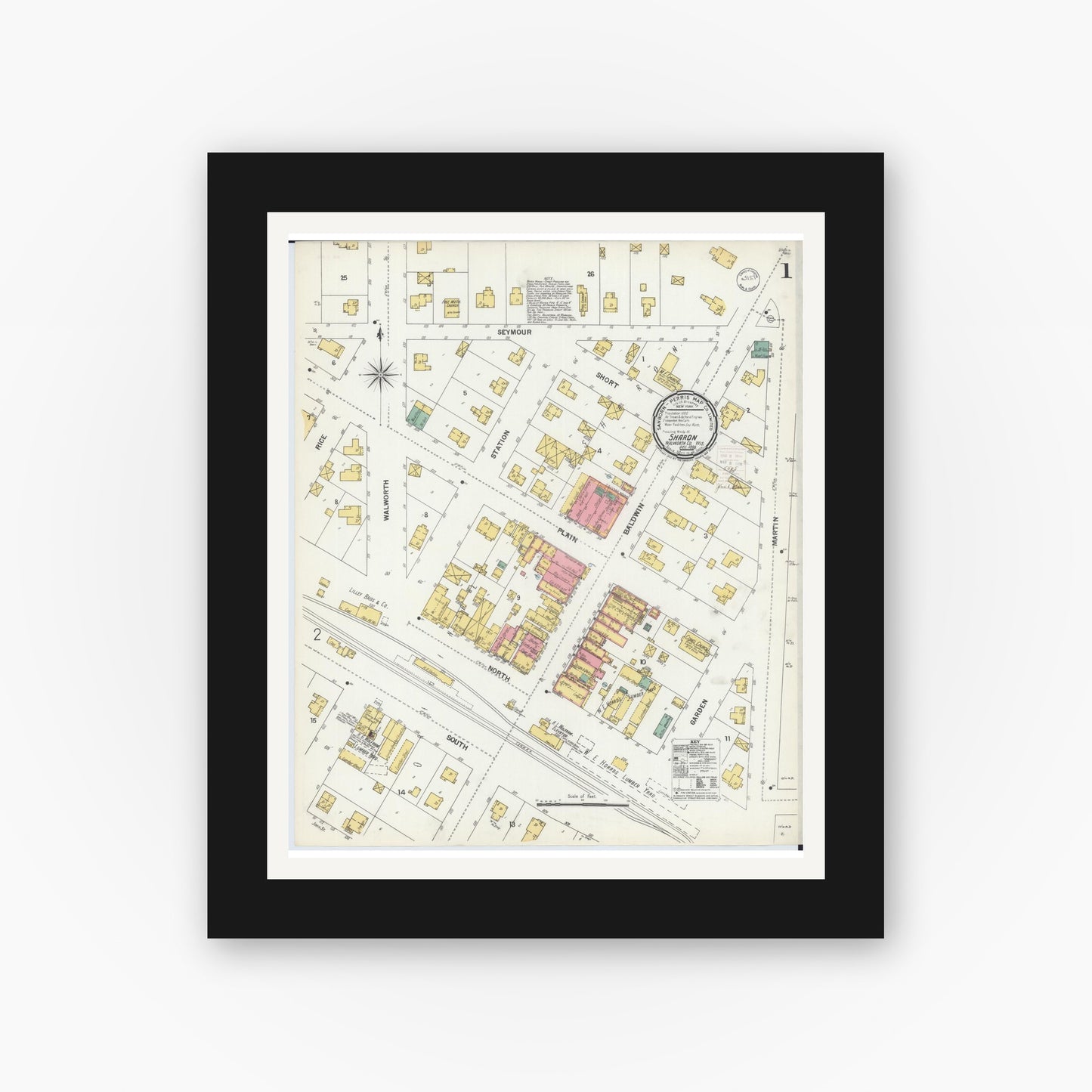 Old map wall art mockup — black gallery frame with white mat — Sanborn Fire Insurance Map from Sharon, Walworth County, Wisconsin (1899), Sheet #0001