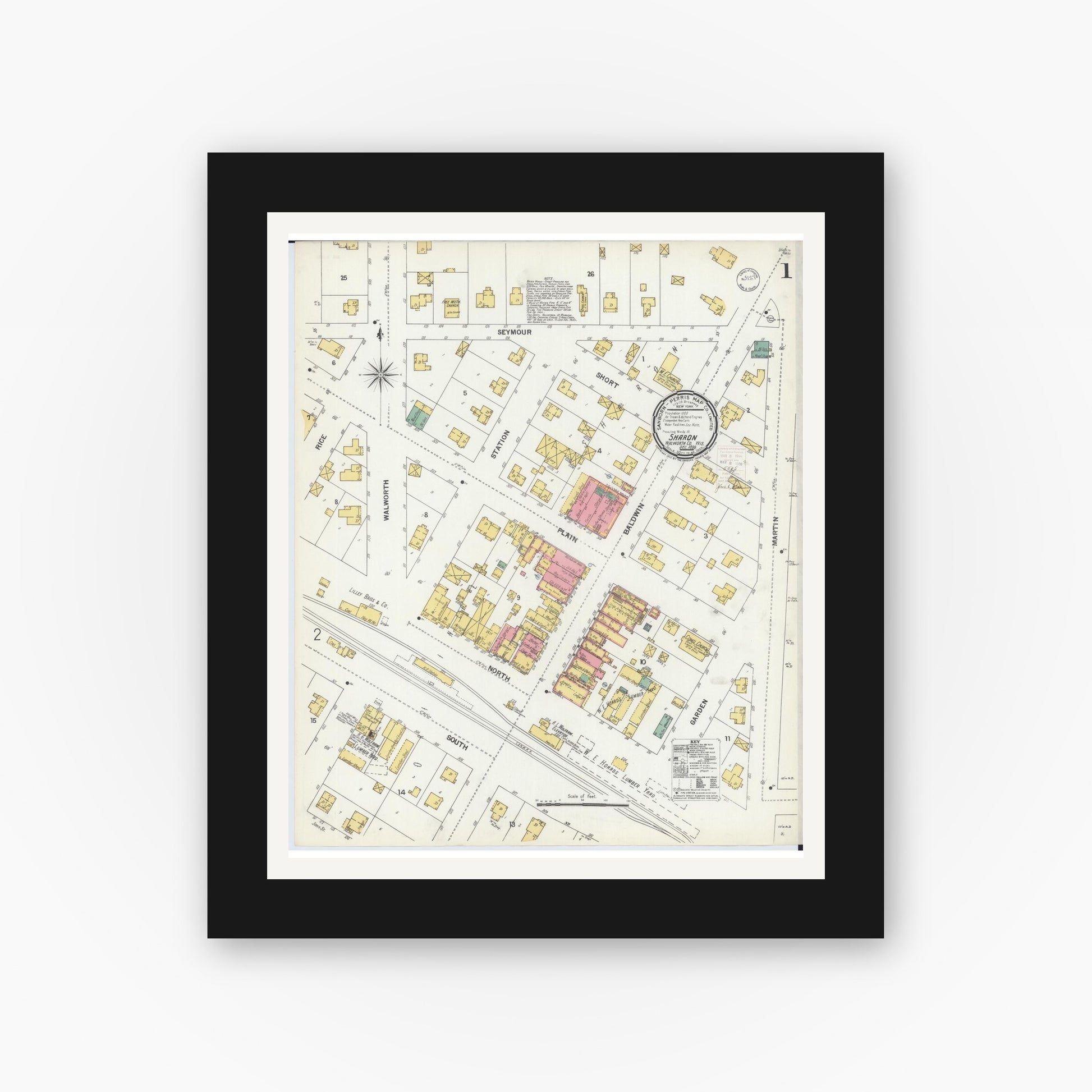 Old map wall art mockup — black gallery frame with white mat — Sanborn Fire Insurance Map from Sharon, Walworth County, Wisconsin (1899), Sheet #0001