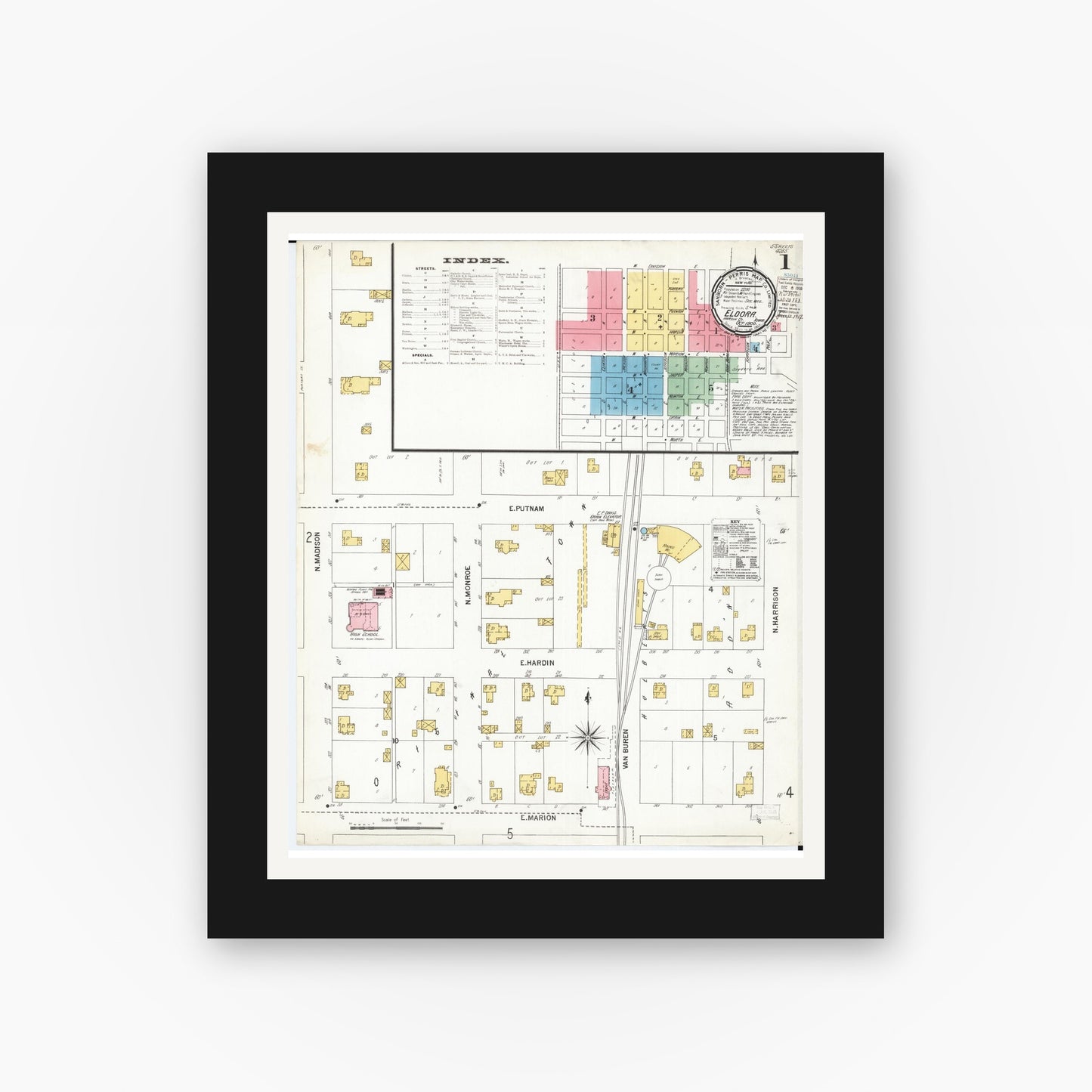 Old map wall art mockup — black gallery frame with white mat — Sanborn Fire Insurance Map from Eldora, Hardin County, Iowa (1900) â€” Complete Set