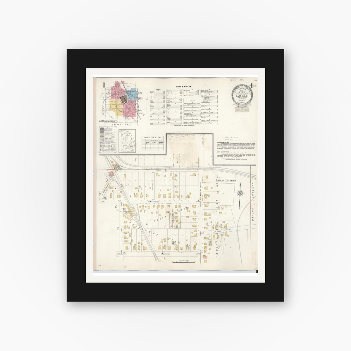 Old map wall art mockup — black gallery frame with white mat — Sanborn Fire Insurance Map from Oxford, Oakland County, Michigan (1945), Sheet #0001