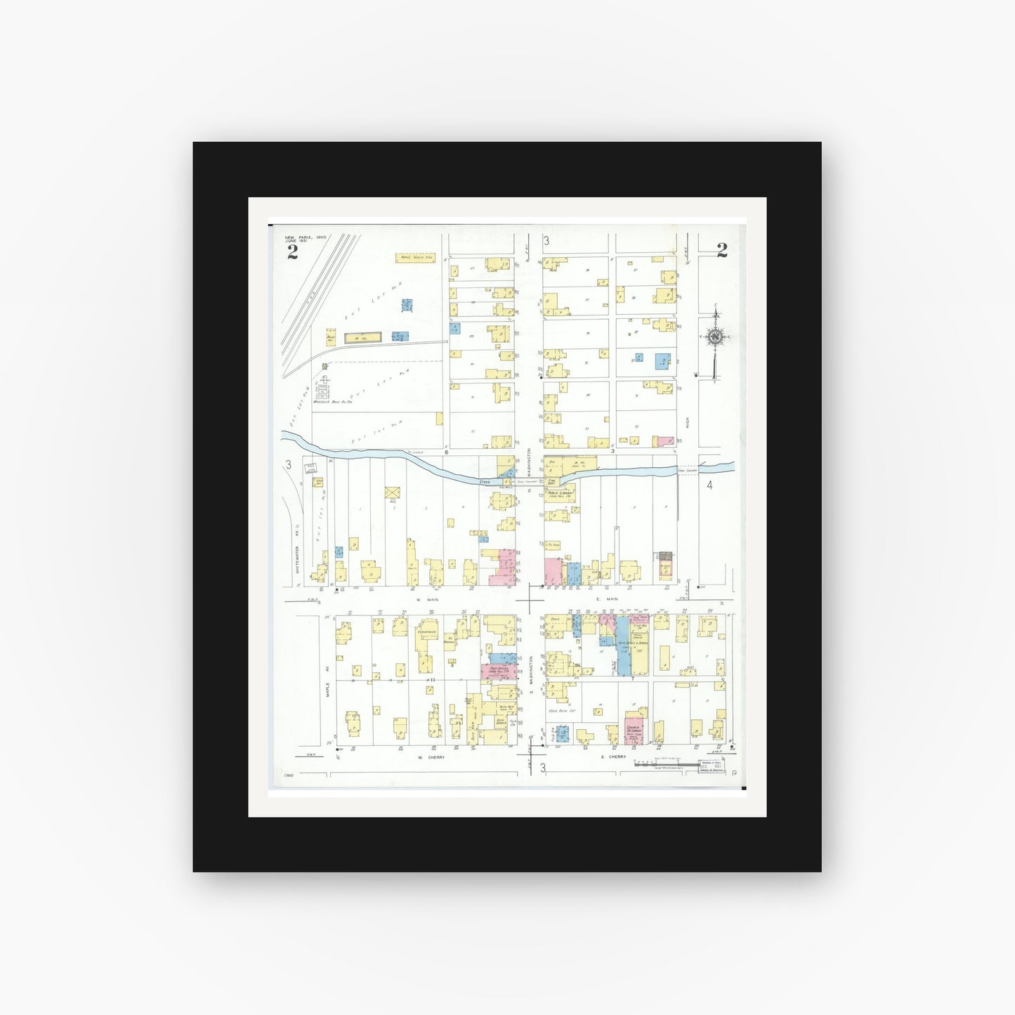 Old map wall art mockup — black gallery frame with white mat — Sanborn Fire Insurance Map from New Paris, Preble County, Ohio (1951), Sheet #0002