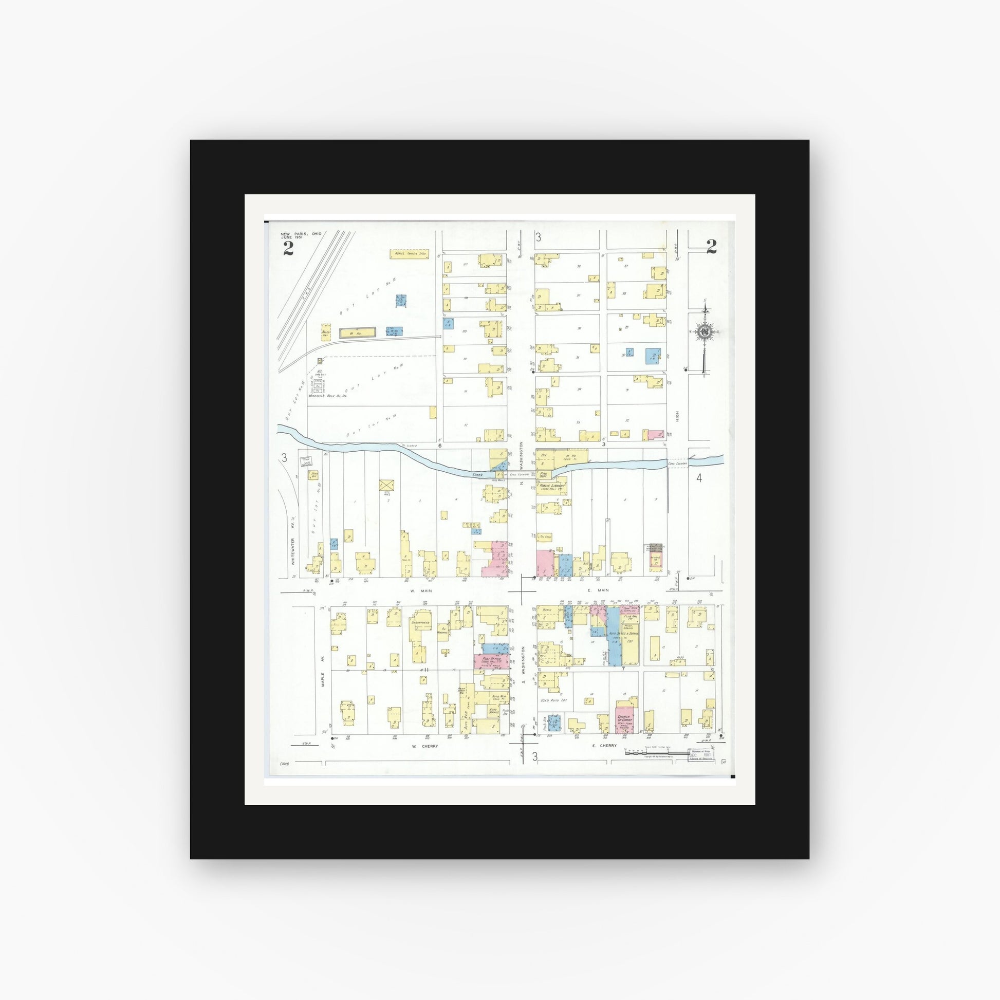 Old map wall art mockup — black gallery frame with white mat — Sanborn Fire Insurance Map from New Paris, Preble County, Ohio (1951), Sheet #0002