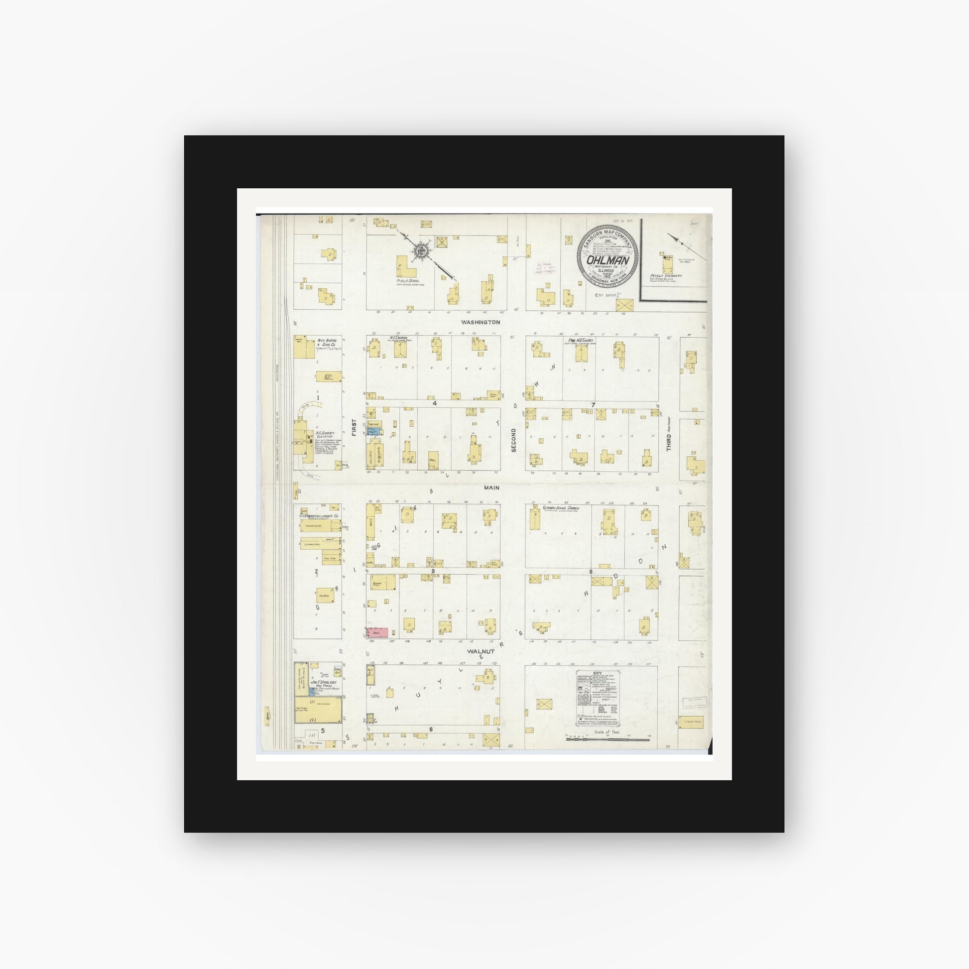 Old map wall art mockup — black gallery frame with white mat — Sanborn Fire Insurance Map from Ohlman, Montgomery County, Illinois (1912), Sheet #0001