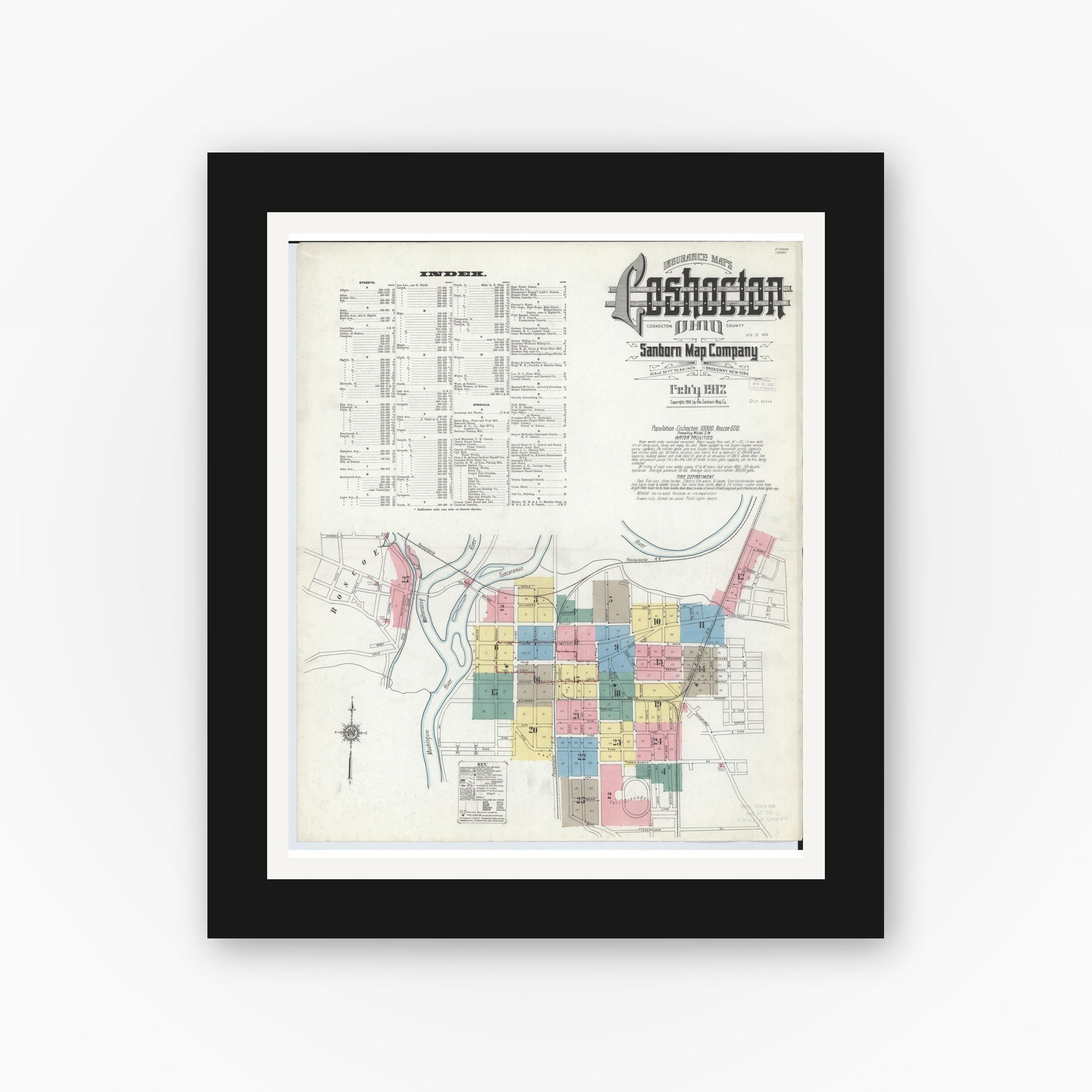 Old map wall art mockup — black gallery frame with white mat — Sanborn Fire Insurance Map from Coshocton, Coshocton County, Ohio (1912), Sheet #0001