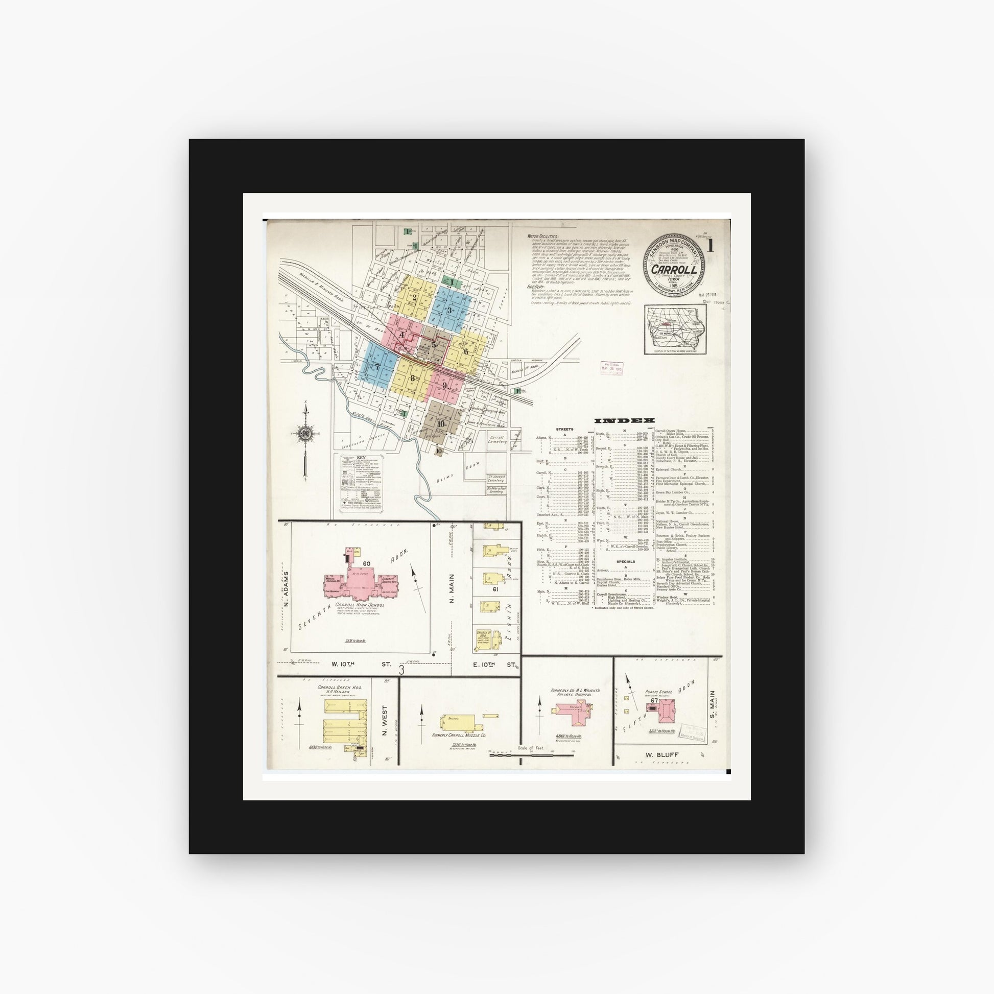 Old map wall art mockup — black gallery frame with white mat — Sanborn Fire Insurance Map from Carroll, Carroll County, Iowa (1915) â€” Complete Set