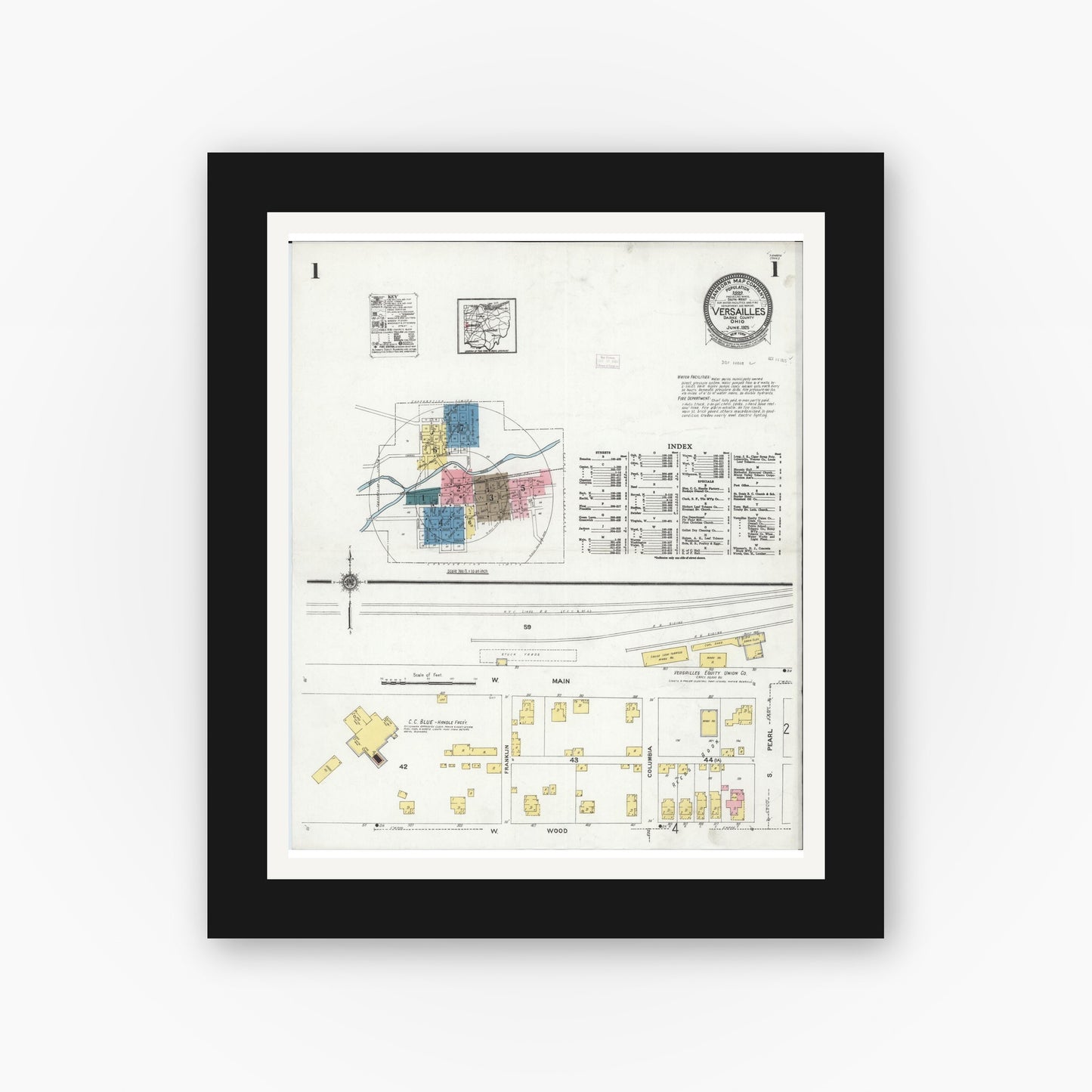 Old map wall art mockup — black gallery frame with white mat — Sanborn Fire Insurance Map from Versailles, Darke County, Ohio (1925), Sheet #0001