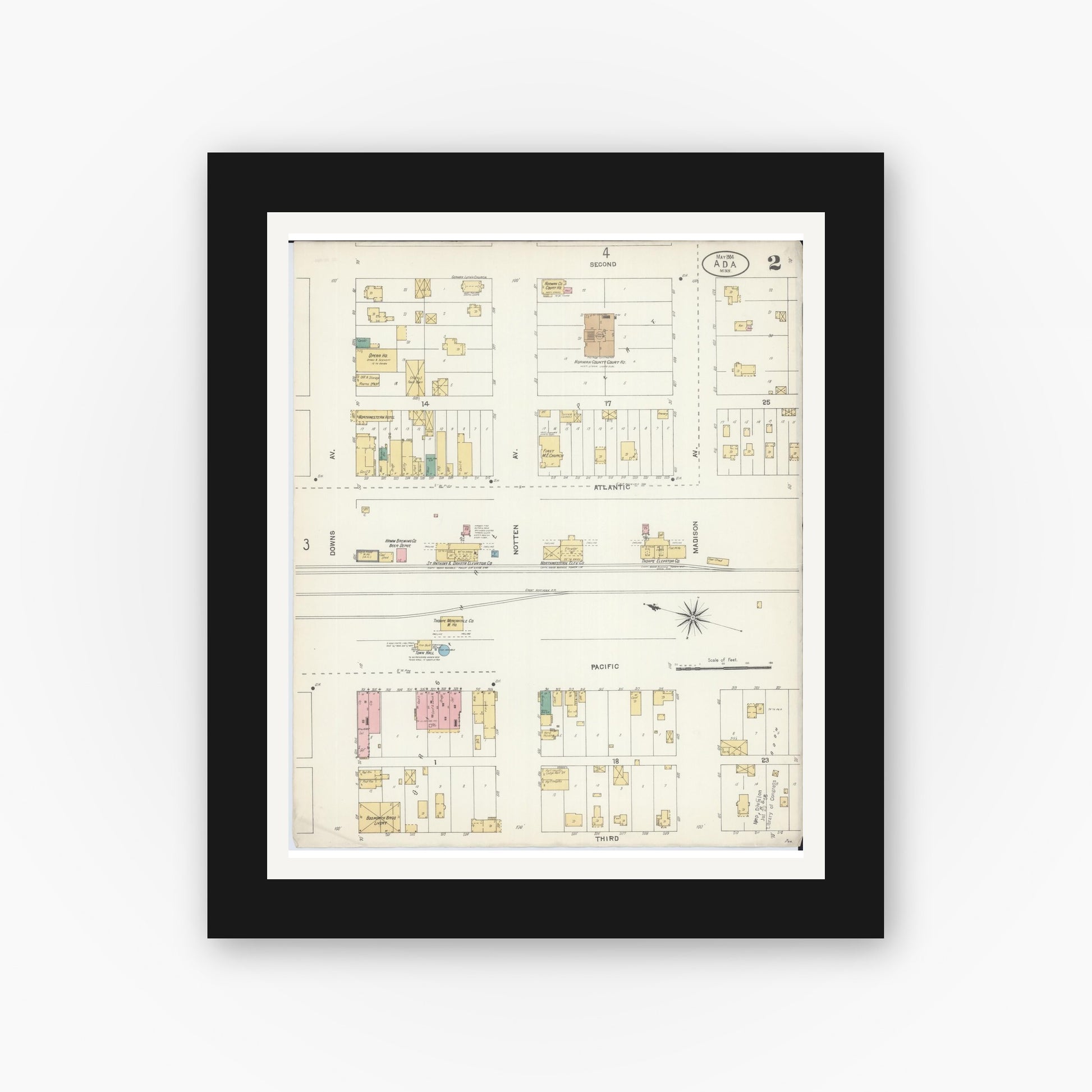 Old map wall art mockup — black gallery frame with white mat — Sanborn Fire Insurance Map from Ada, Norman County, Minnesota (1904), Sheet #0002