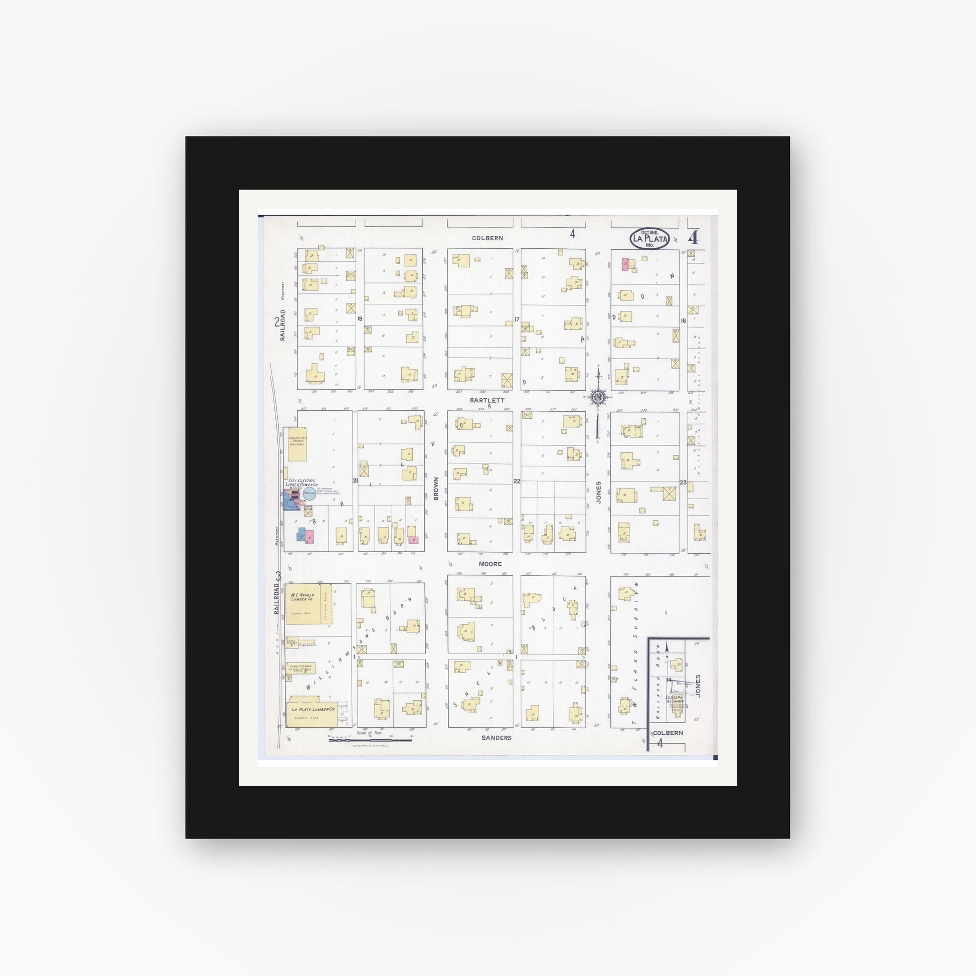 Old map wall art mockup — black gallery frame with white mat — Sanborn Fire Insurance Map from La Plata, Macon County, Missouri (1916), Sheet #0004